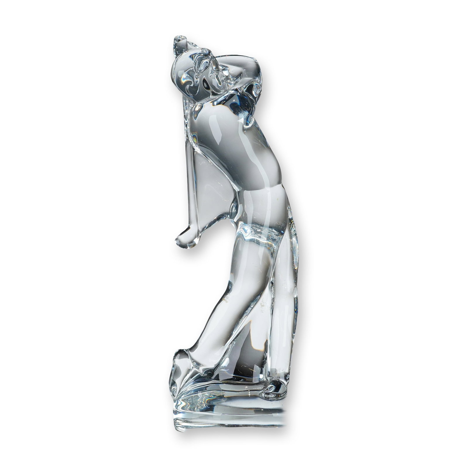 Baccarat Clear Crystal Golfer Figurine: Baccarat. Stylized figurine of a male golfer in clear lead crystal, depicted at the apex of a follow-through swing. The figure is modeled with fluid, modern lines and is set on an integral oval base. 