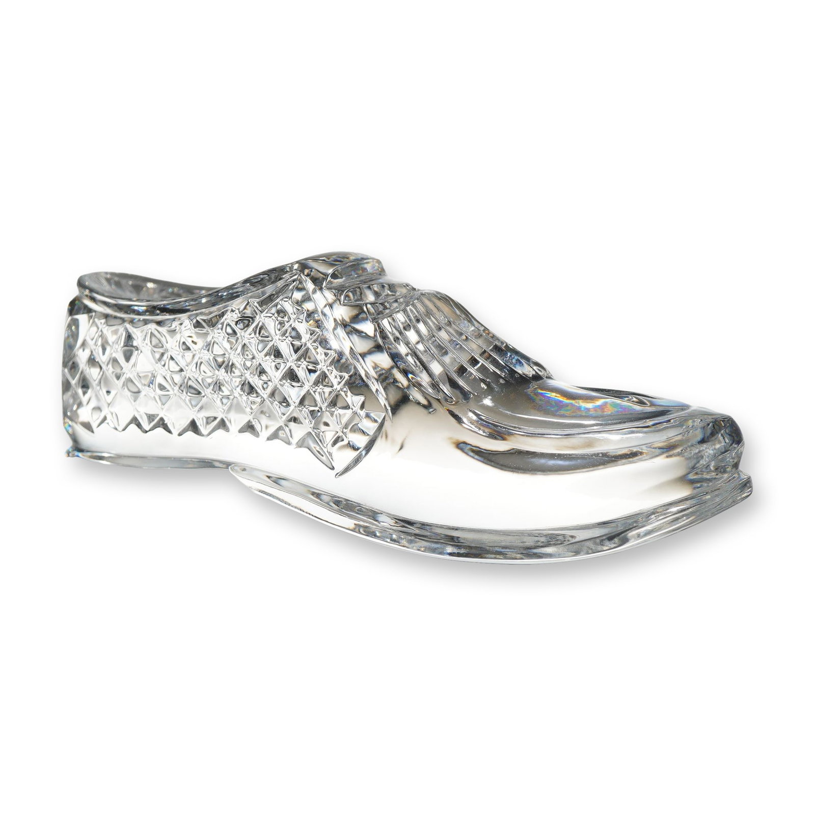 Waterford Crystal Golf Shoe Figurine: This lead crystal figurine is designed in the form of a classic kiltie loafer golf shoe. The clear glass body features intricate cut-glass detailing, including a diamond-hatch pattern on the heel and 