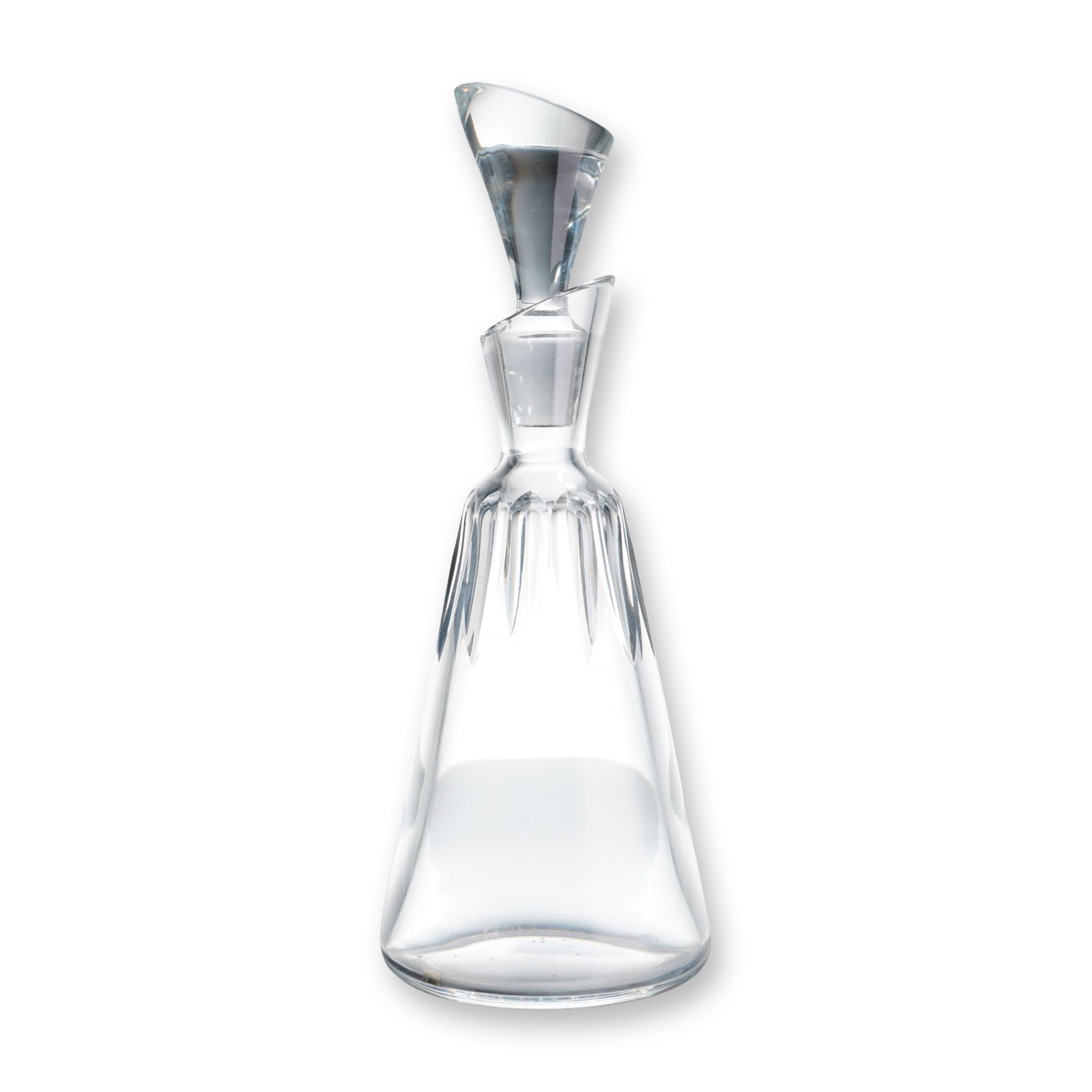 Baccarat Cote d'Azur Decanter with Stopper: Baccarat, France. Cote d'Azur glass decanter with matching stopper, featuring a tapered conical body decorated with vertical wedge-shaped facet cuts. The design is characterized by an asymmetrical sla