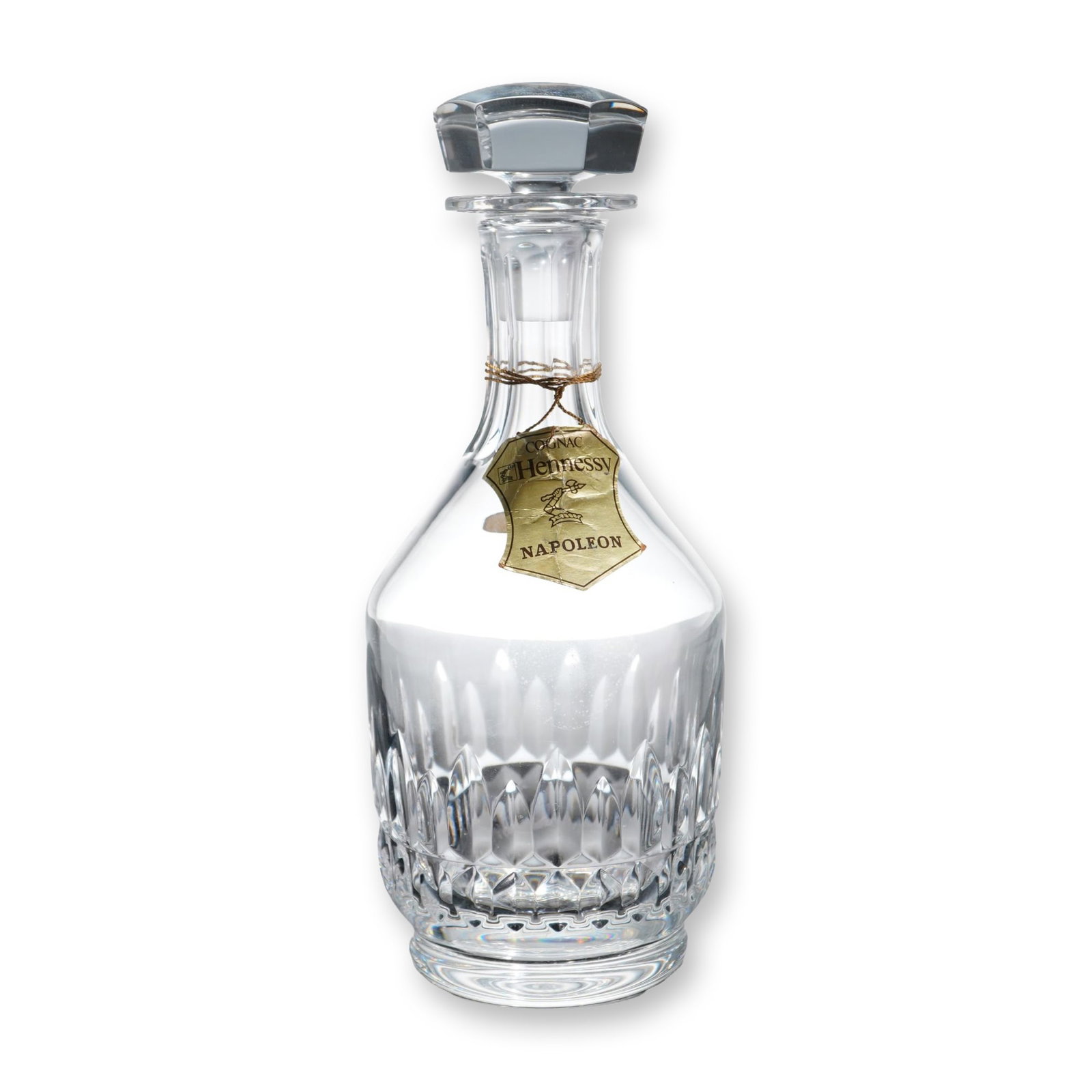 Baccarat Canterbury Hennessy Napoleon Cognac Decanter with Stopper: Baccarat Canterbury pattern crystal decanter produced for Hennessy Napoleon Cognac. The vessel features a tapered neck with vertical fluted cuts and a flared rim, paired with a matching hexagonal face