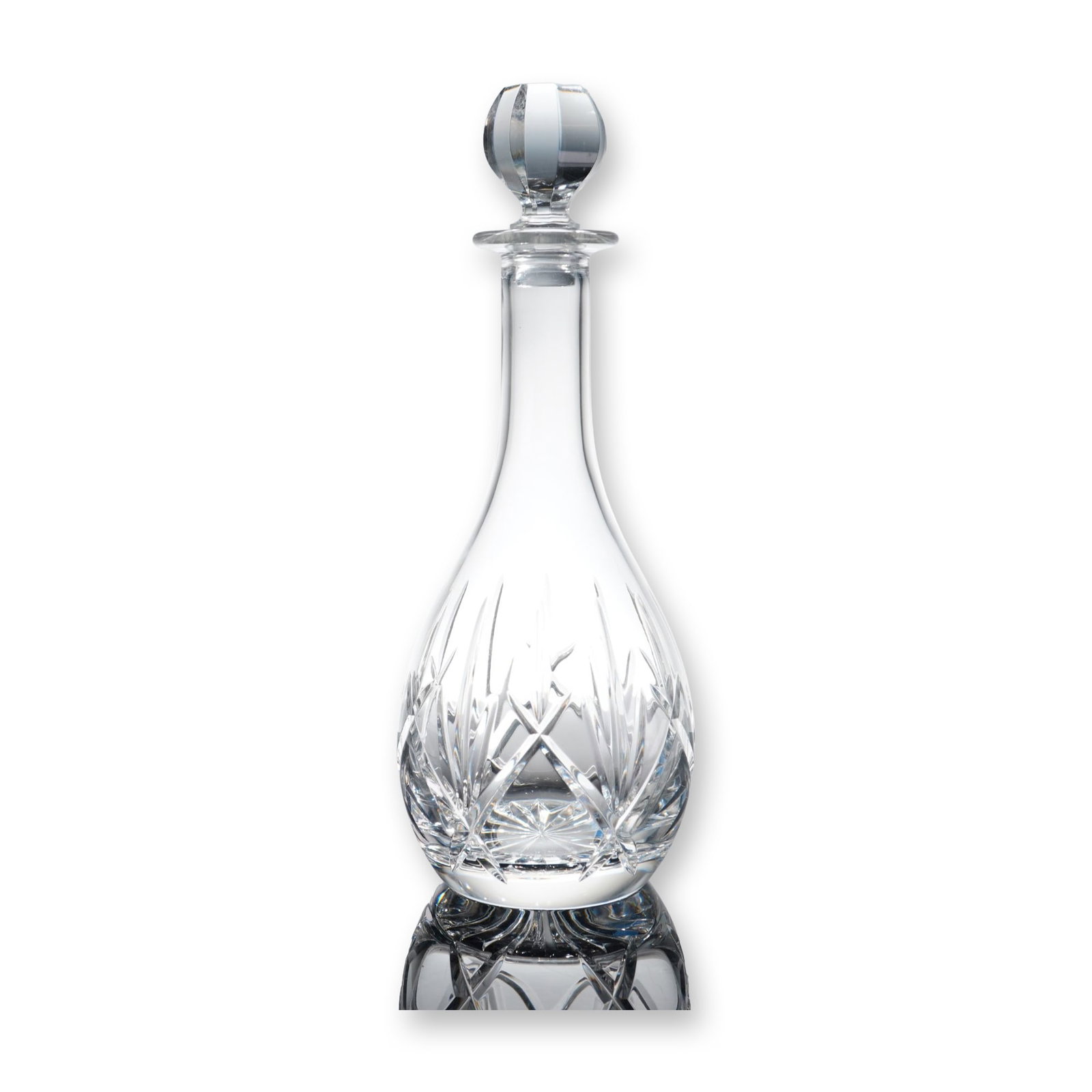 Waterford Nocturne Pattern Crystal Decanter: This Waterford lead crystal decanter in the Nocturne pattern features a teardrop-shaped body with deep vertical wedge cuts and diagonal faceting near the base. The neck is faceted below a flared rim,