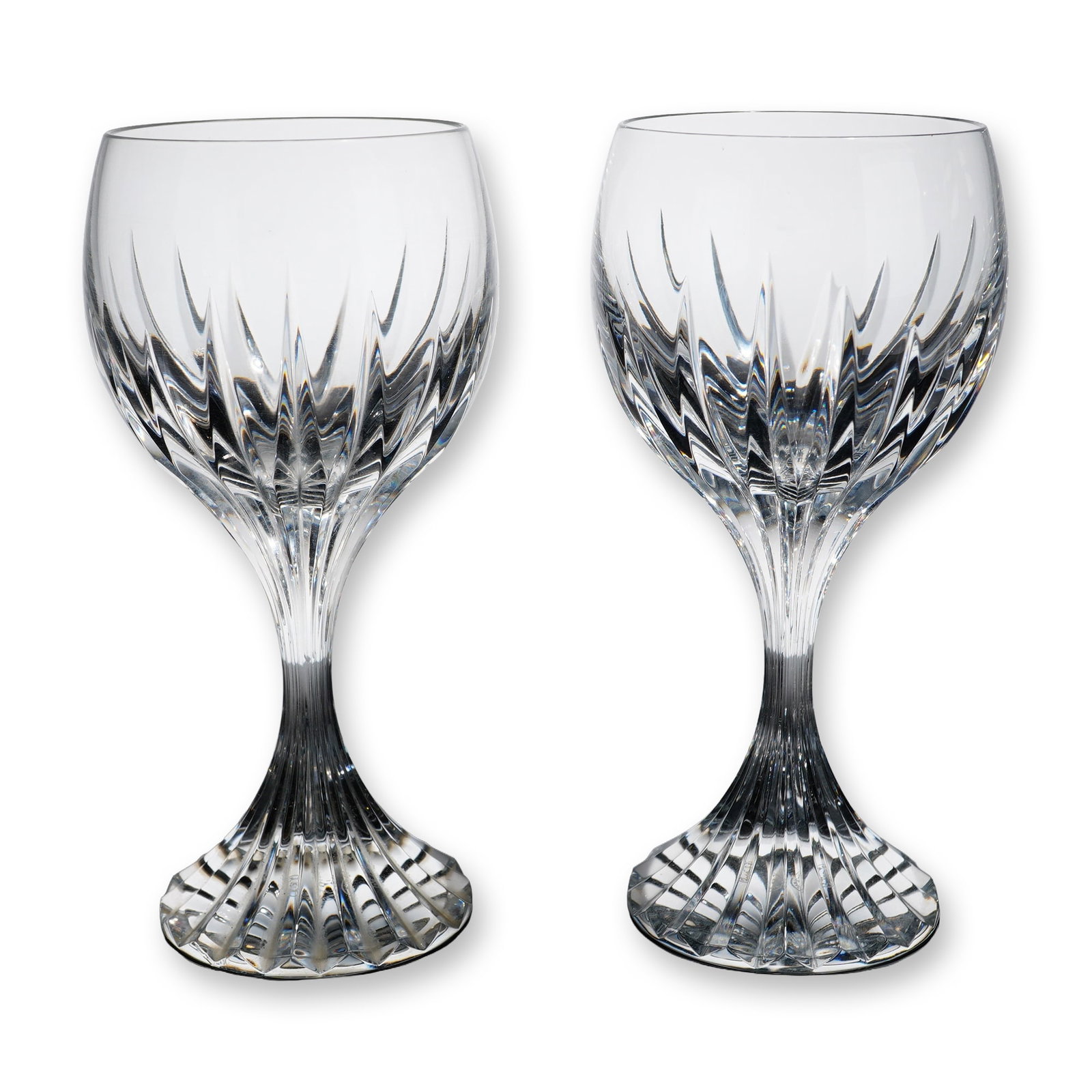 Pair of Baccarat Massena Crystal Wine Goblets: Pair of Baccarat crystal wine goblets in the Massena pattern. Each lead-crystal glass features a rounded balloon bowl decorated with deep, polished vertical bevel cuts tapering to points, an