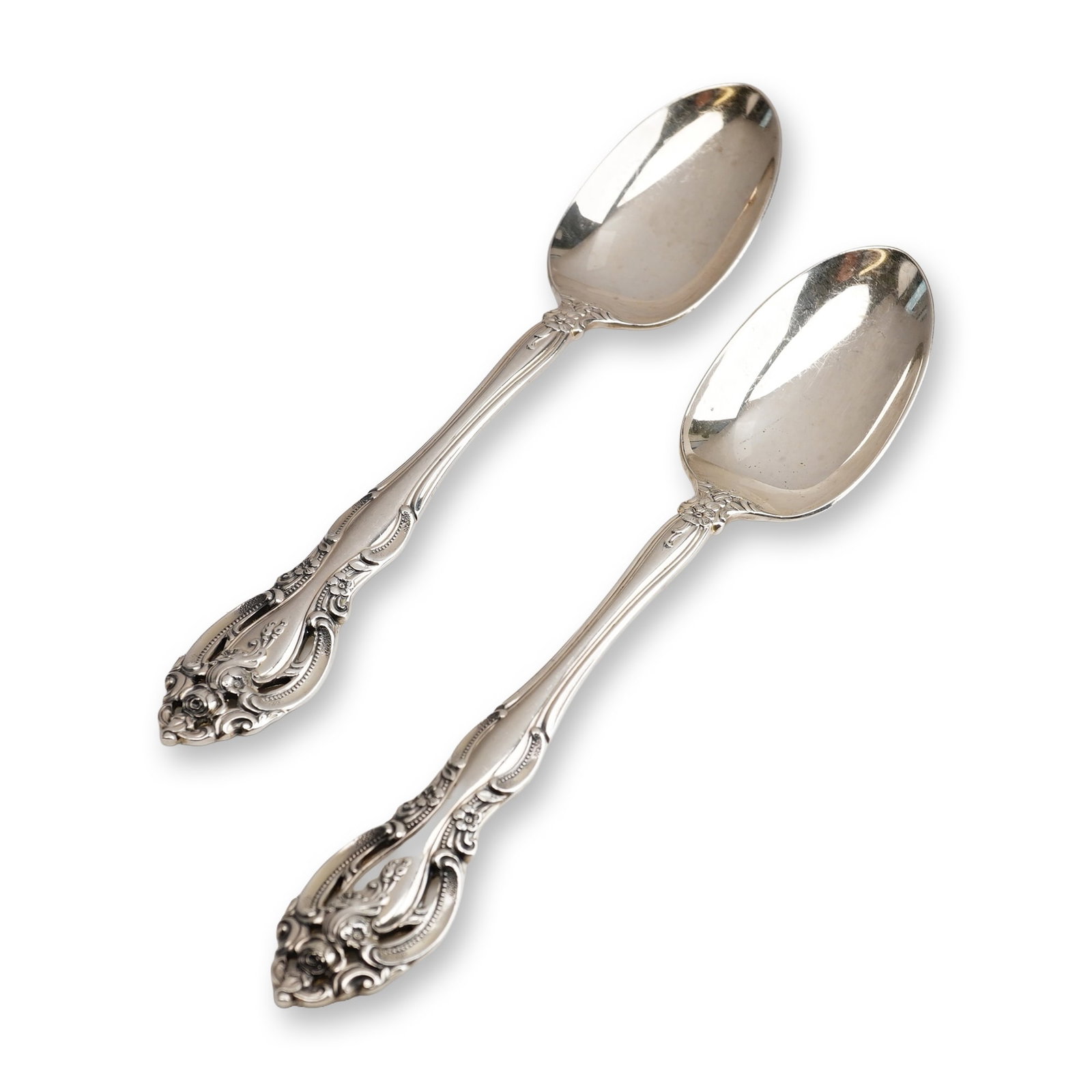 2pc Gorham Sterling Silver Teaspoon, La Scala: An ornate Rococo Revival style featuring heavy scrollwork and floral motifs centered around a rose. The handle terminals are characterized by distinctive pierced openwork detailing. On the reverse of 