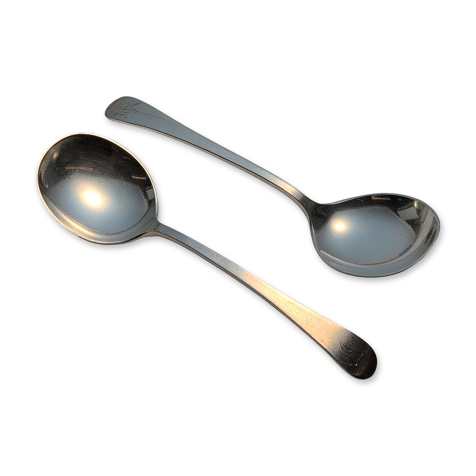 2pc Tuttle Silver Company Sterling Silver Round Soup Spoons, Hannah Hull: Pair of sterling silver soup spoons with plain handles. Each handle terminal is engraved with a stylized monogram. The reverse of each handle is stamped STERLING and bears the Tuttle Silver Company ha