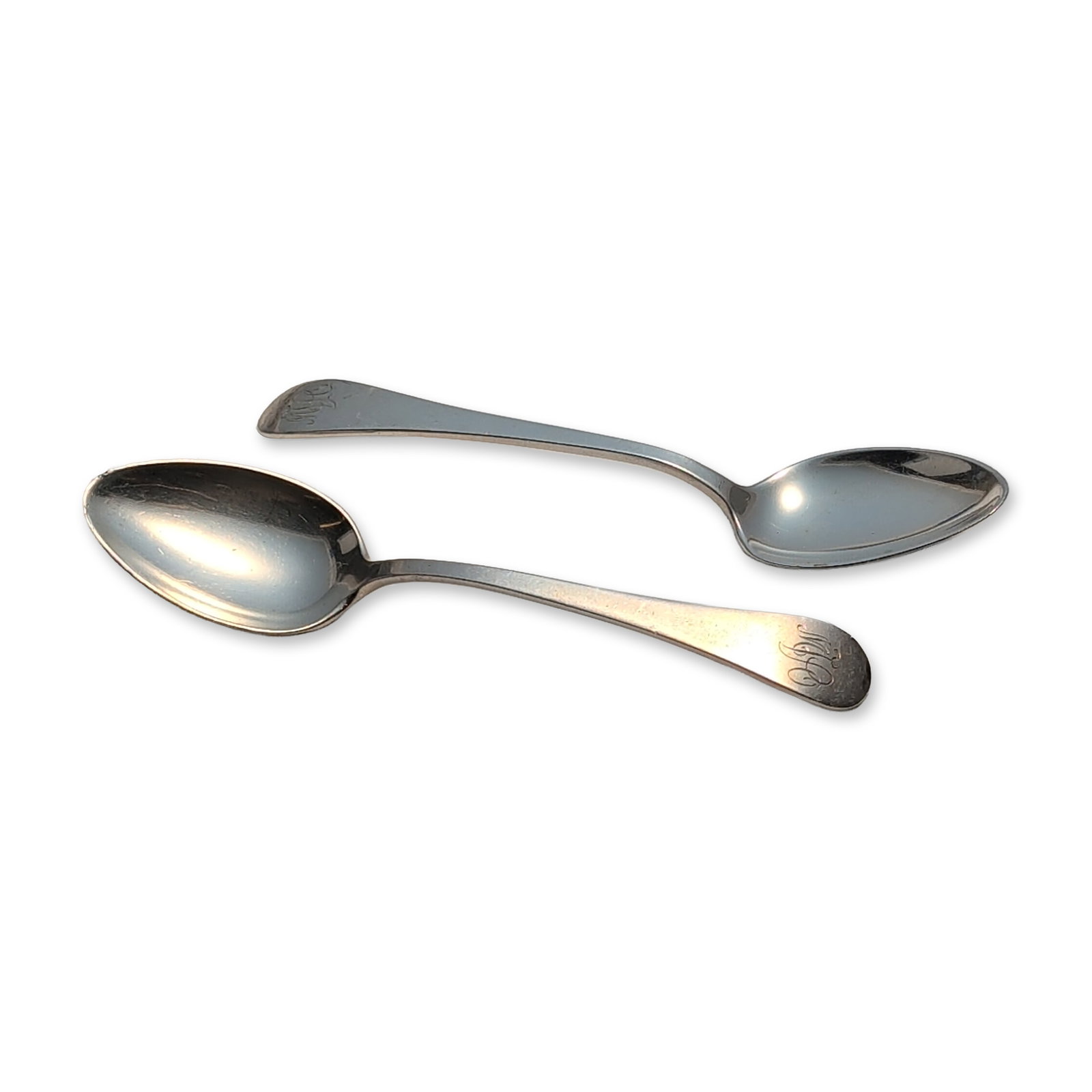 2pc Tuttle Silver Company Sterling Silver Teaspoons, Hannah Hull: Pair of sterling silver teaspoons with plain handles. The handle terminals feature engraved stylized monograms. The reverse of each handle is stamped STERLING and bears the hallmarks of the Tuttle Sil