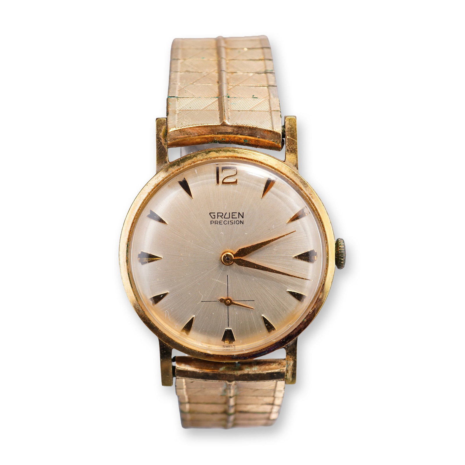 Gruen Precision 510 Gold-Plated Manual Wind Wristwatch: Vintage Gruen Precision model 510 manual wind wristwatch, featuring a silver-toned sunburst dial with applied gold-toned dagger-style hour markers and an Arabic numeral 12. The dial is equipped with g