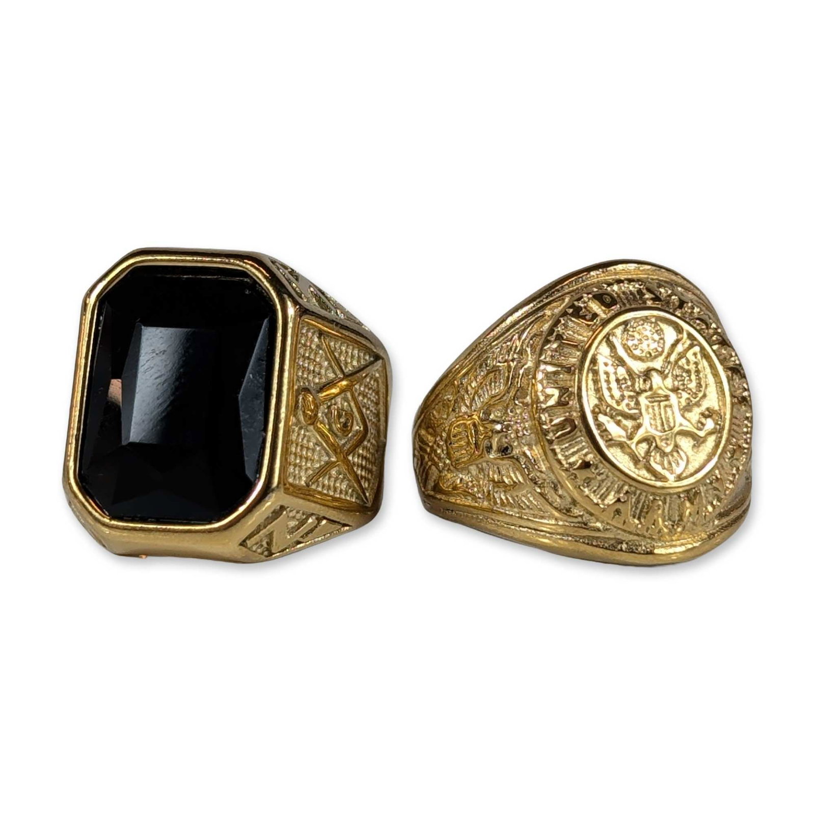 Two Gold-Tone Fraternal and Crest Signet Rings: Two men's gold-tone signet rings. The first is a Masonic themed ring featuring a large, rectangular faceted black stone bezel-set within a stepped mounting. The shoulders are decorated with the Masoni