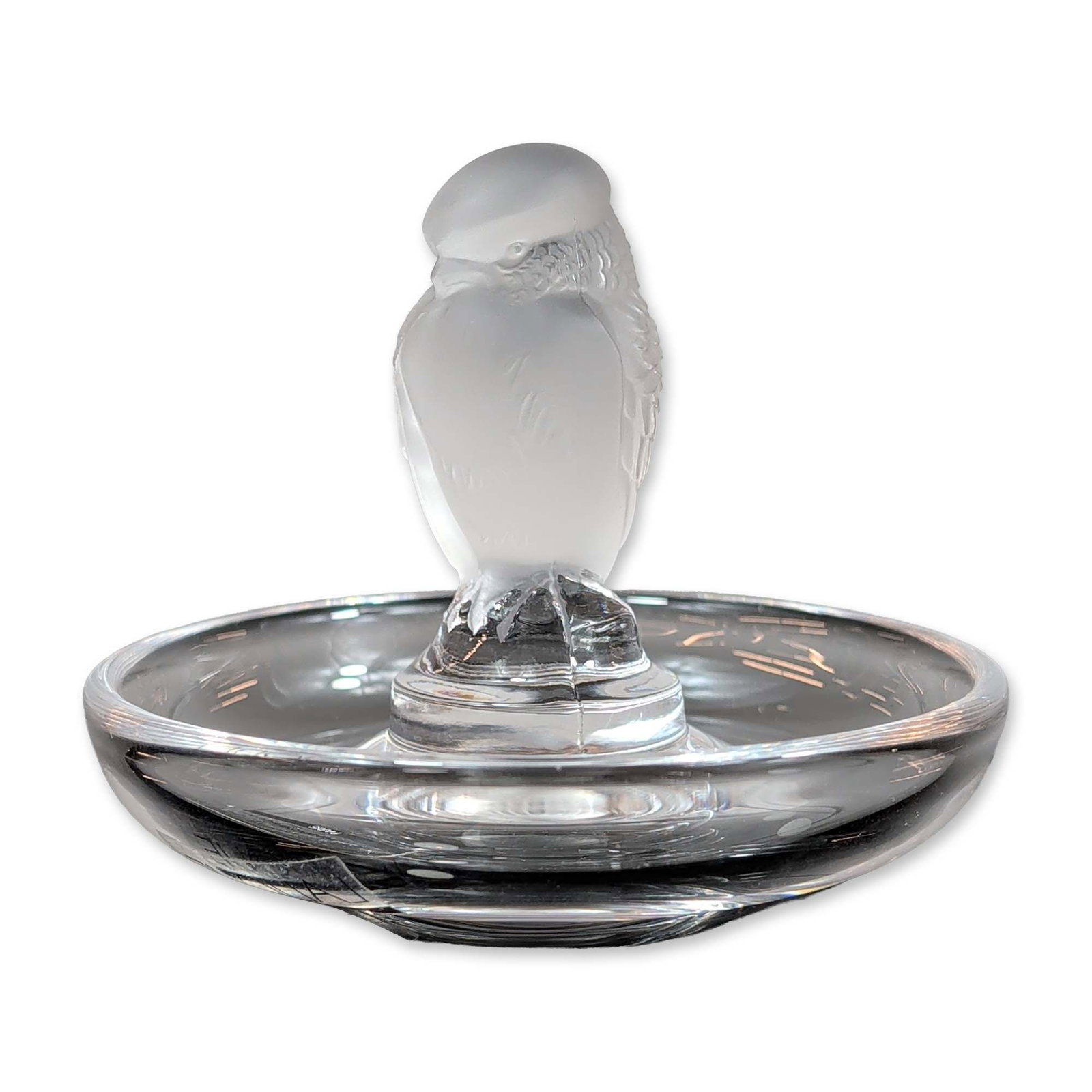 Lalique France Crystal Sparrow Ring Dish: Lalique France circular ring dish in clear and frosted crystal, featuring a centrally mounted frosted crystal figurine of a sparrow in a naturalistic pose with a turned head and detailed feathering. T