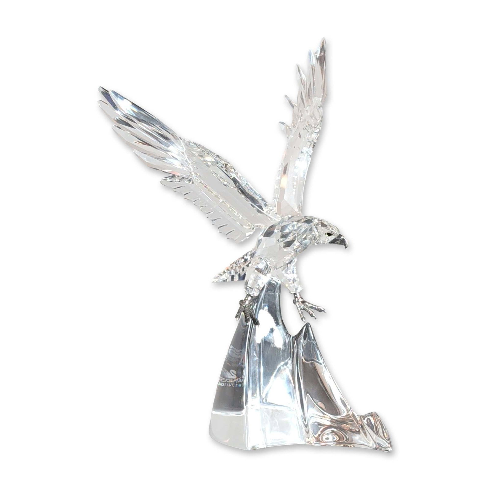 Swarovski 1995 Limited Edition Crystal Eagle Sculpture: Swarovski Silver Crystal limited edition sculpture titled The Eagle (Der Adler), designed by Adi Stocker. The sculpture is composed of faceted and molded crystal, featuring an eagle in a dynamic pose 