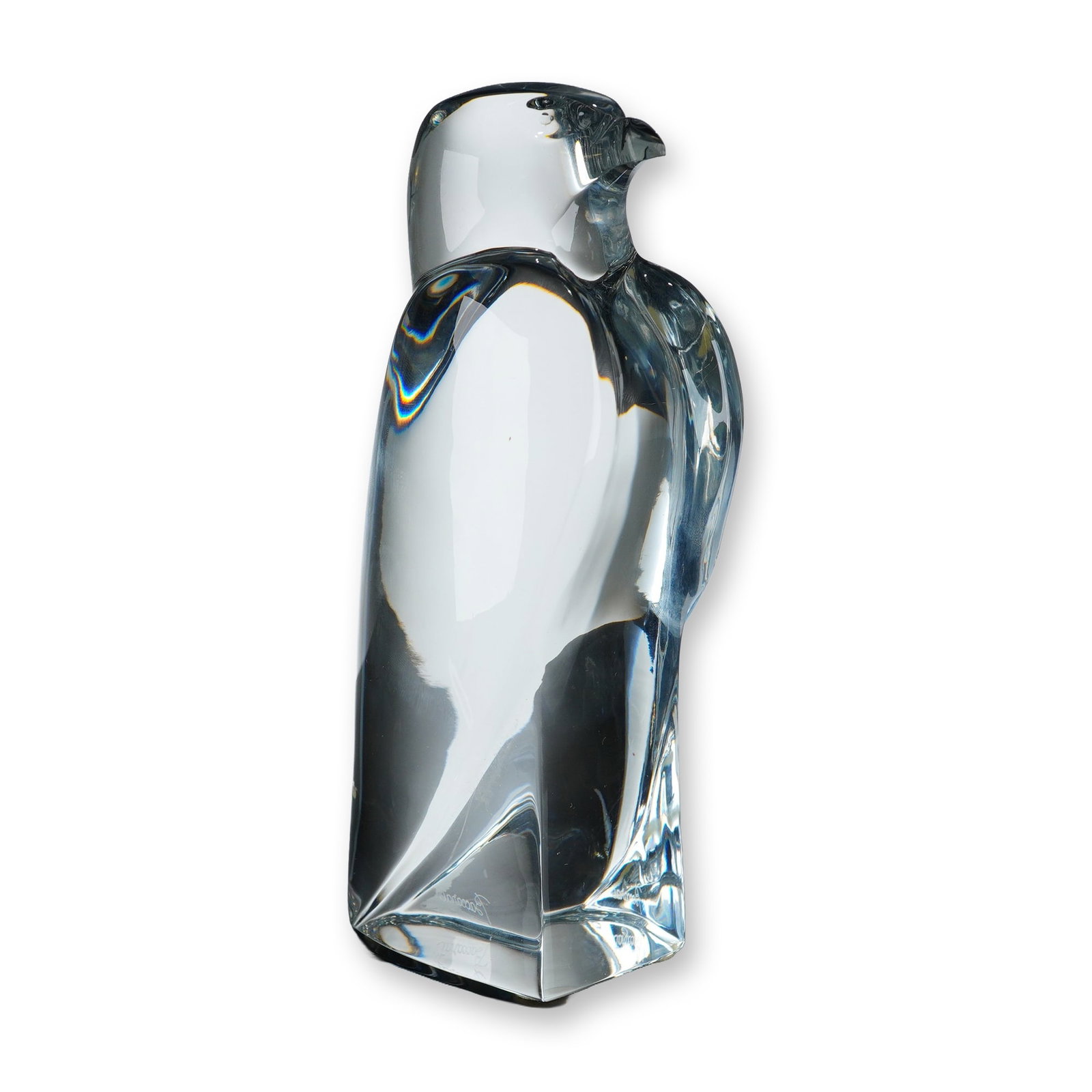 Baccarat Crystal Maltese Falcon Figurine: Baccarat crystal figurine of a Maltese Falcon, featuring a stylized minimalist form with a high-polished finish. The bird is depicted in a standing posture with the head turned slightly to the right a