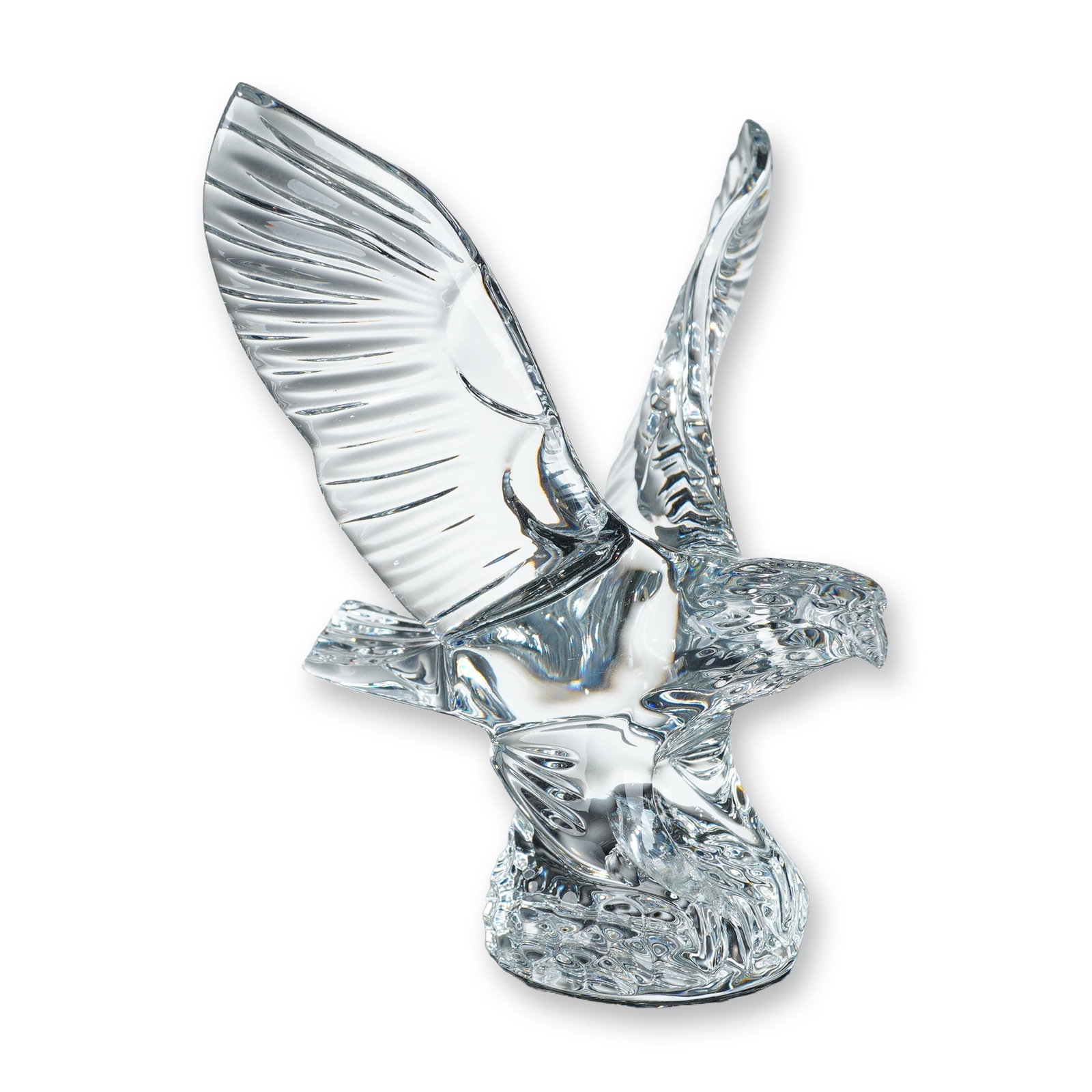 Waterford Crystal Flying Eagle Figurine: Waterford lead crystal eagle figurine featuring a bird in flight with wings swept upward and fanned tail feathers. The figure is perched on a textured rock-form base and bears an acid-etched Waterford