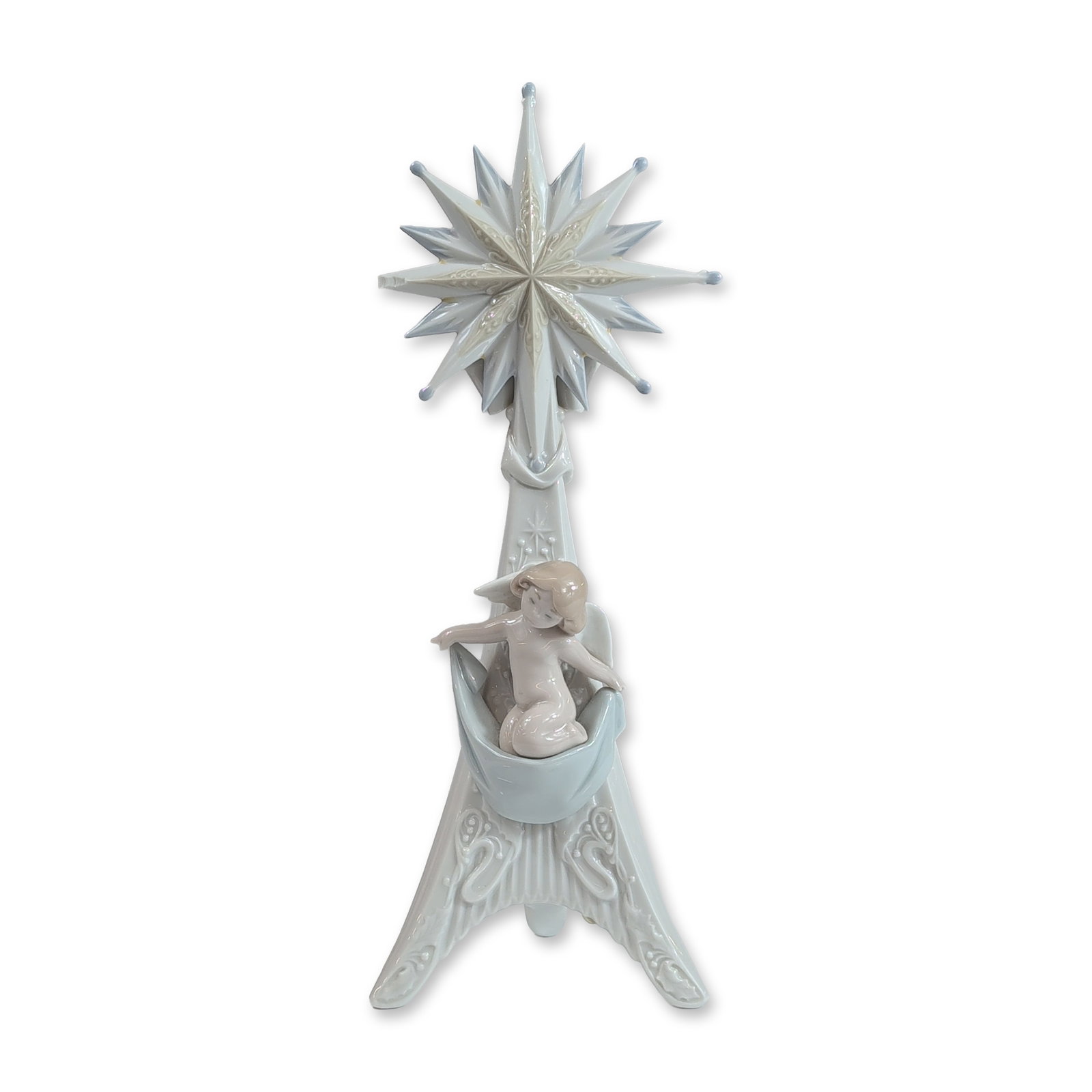 Lladro Porcelain Holiday Light 6619 Candle Holder: Lladro (Spain). Porcelain candle holder titled Holiday Light or Luz de Navidad, model number 56619. The piece features a glazed porcelain cherub figure reclining along the scrolling tail of a multi-po