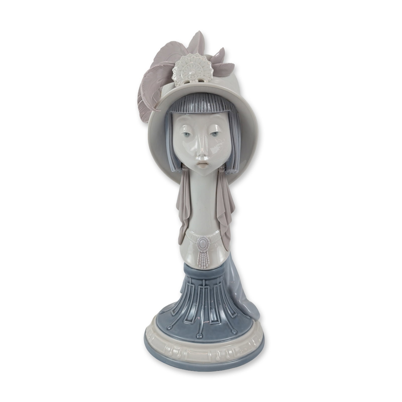 Lladro Spanish Glazed Porcelain Girl's Head: Lladro (Valencia, Spain) glazed porcelain figurine titled Girl's Head (Cabeza Pendientes Telas), model number 5151. Designed by sculptor Jose Puche. The bust features a woman in an Art Deco influenced
