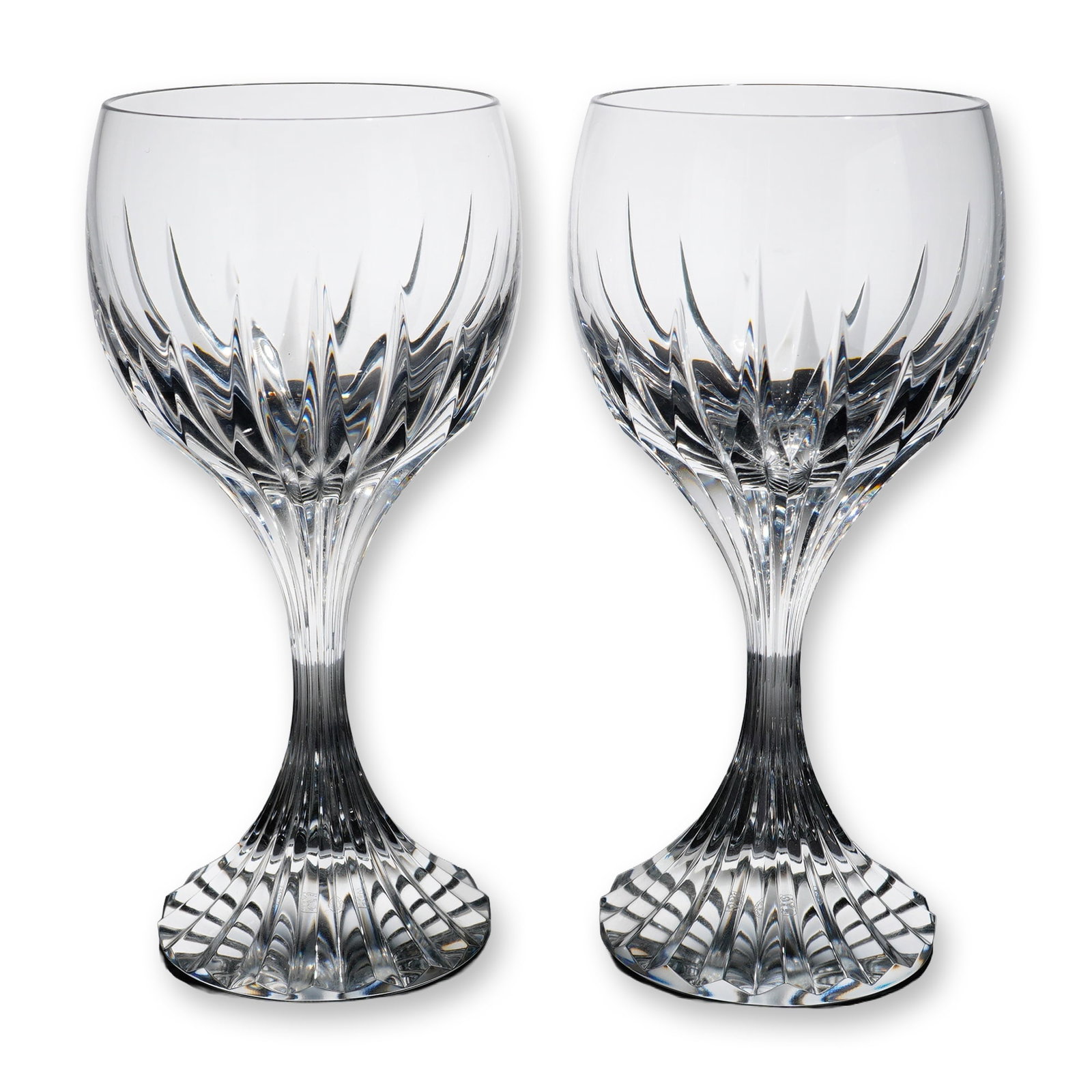Pair of Baccarat Crystal Massena Wine Glasses: Baccarat (France) pair of Massena pattern wine glasses in lead crystal. Each glass features a rounded bowl decorated with deep, stylized vertical wedge cuts forming a crown pattern around the lower ha