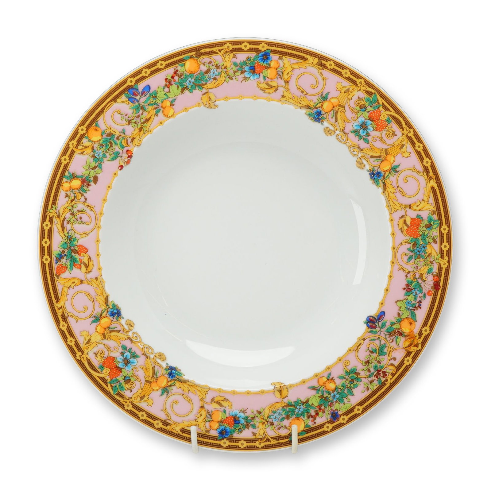 Rosenthal Versace Le Jardin de Versace Porcelain Rim Soup Bowl: Rosenthal for Versace porcelain rim soup bowl in the Le Jardin de Versace pattern. The piece features a wide pink border decorated with gold-toned baroque scrollwork intertwined with strawberries, cit