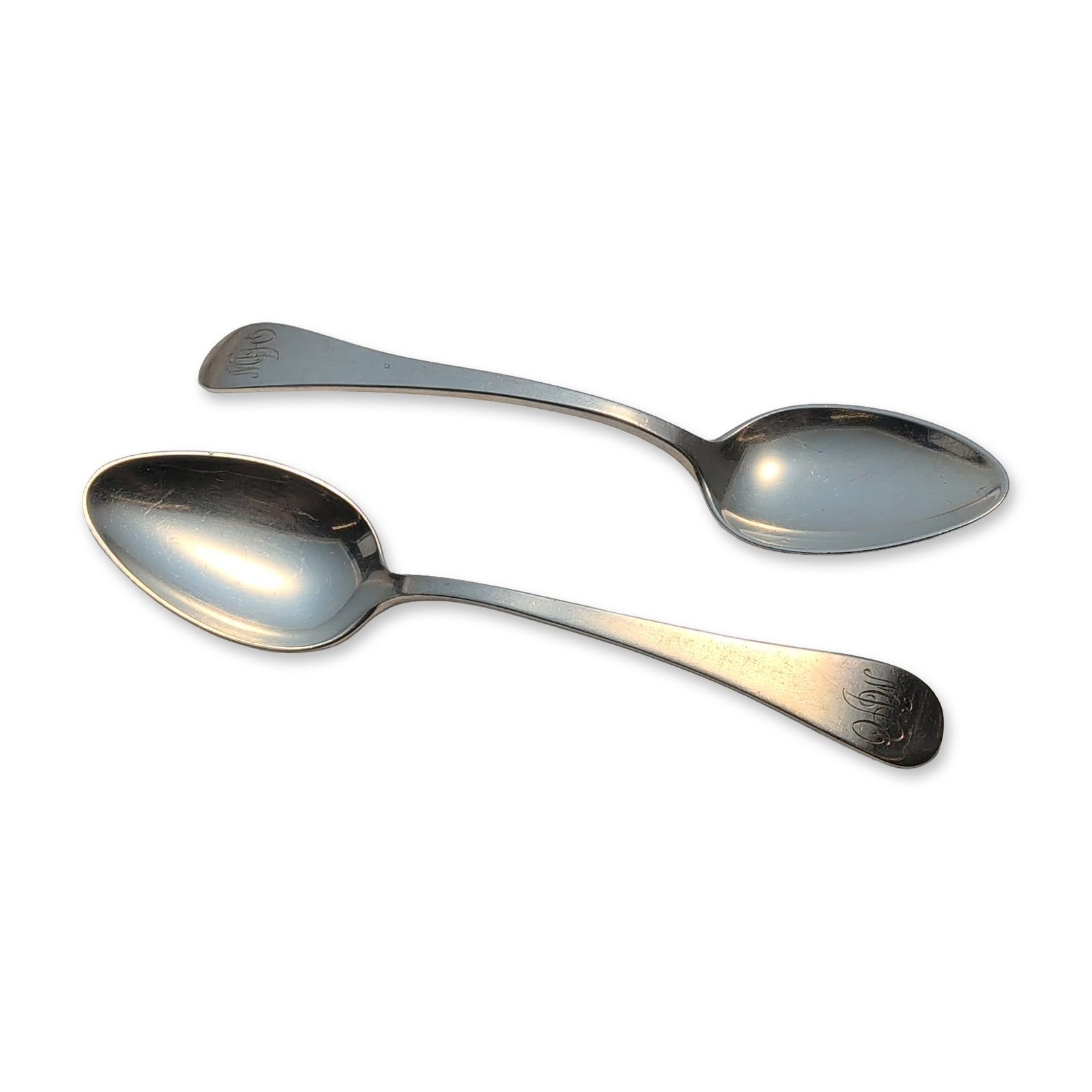 2pc Tuttle Silver Company Sterling Silver Teaspoons, Hannah Hull: Pair of plain-handled sterling silver teaspoons, each engraved with a stylized monogram on the handle terminal. The reverse of the handles is stamped STERLING and marked with the hallmarks of the Tutt