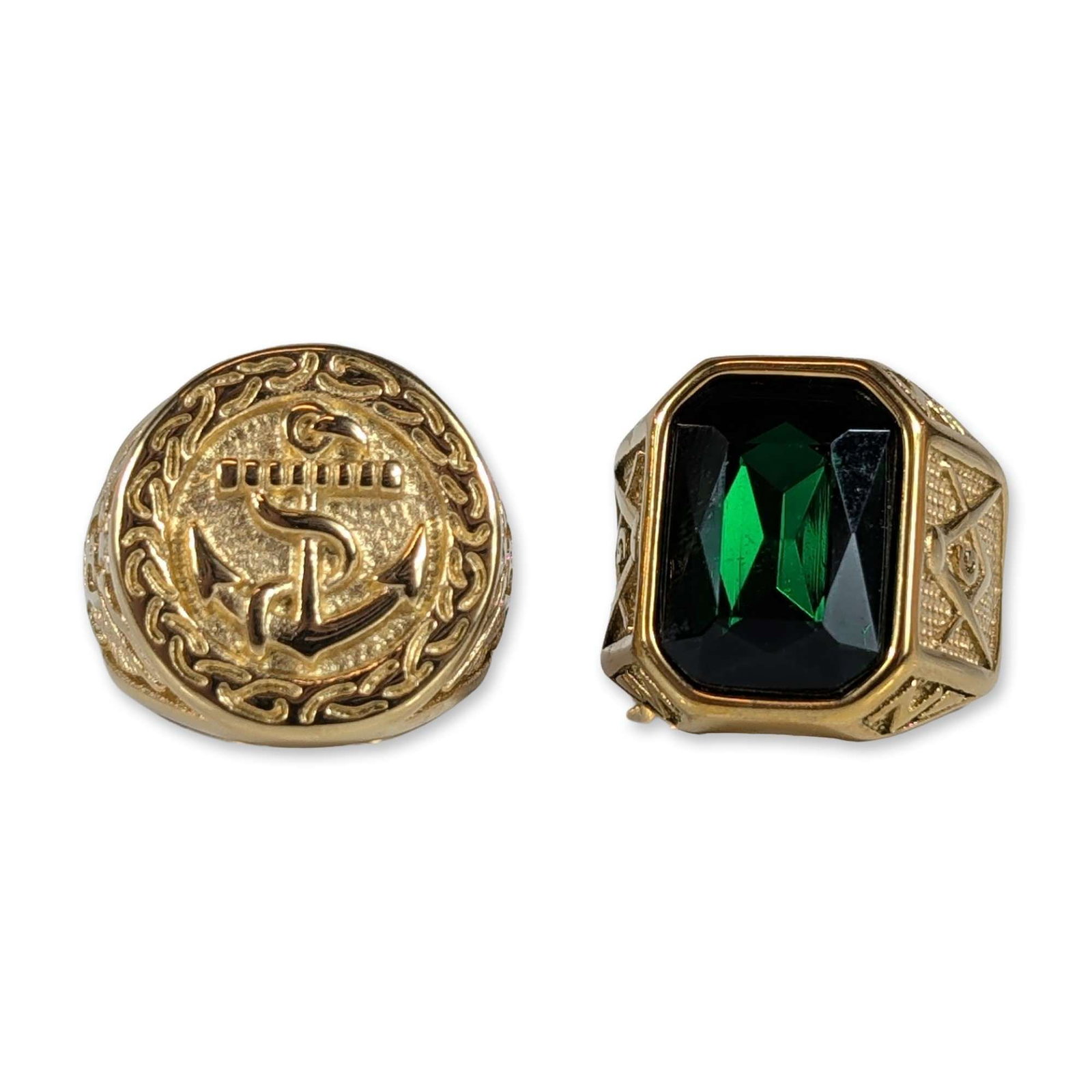Pair of Gold-Tone Military and Fraternal Rings: Pair of men's signet-style rings in gold-tone metal. The first is a US Navy-style commemorative ring featuring a circular face with a raised fouled anchor emblem within a braided border, with shoulder