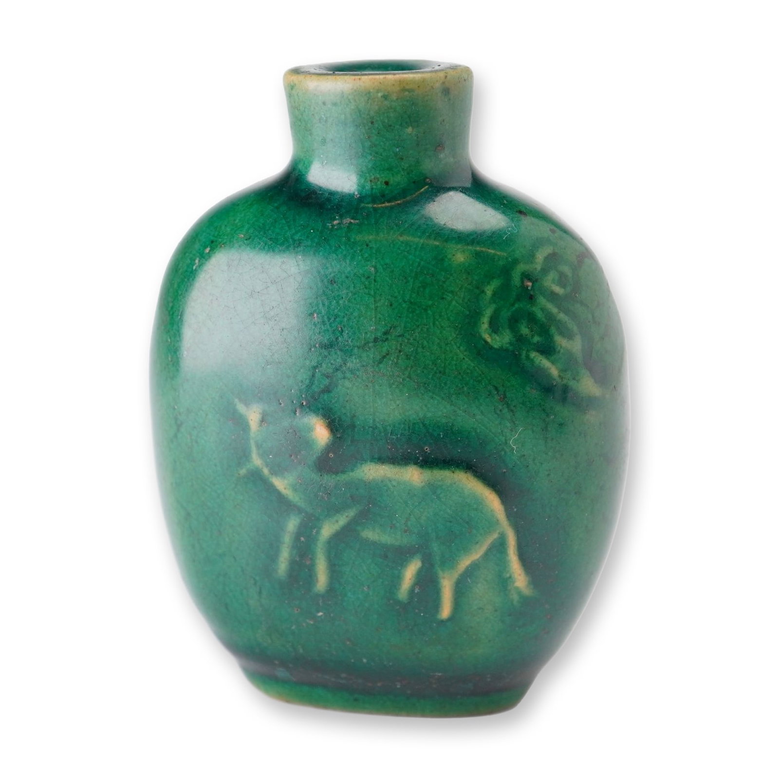 Green Glazed Porcelain Snuff Bottle, Low Relief Animals: A porcelain snuff bottle featuring an emerald-green glaze, decorated with low-relief depictions of animals. Dimensions: 1.75"L x 1"W x 2.5"H Weight: 1.8 oz