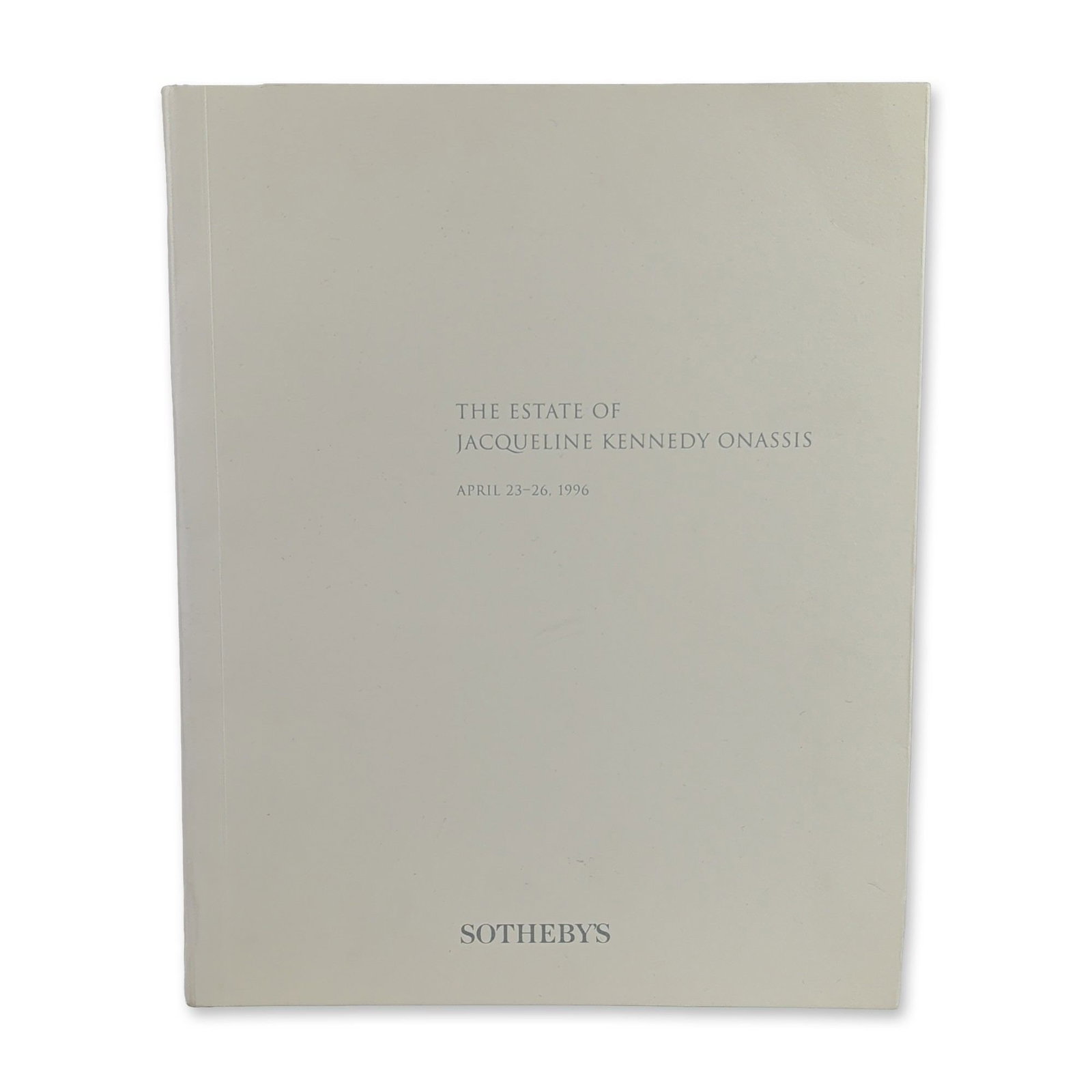 Sotheby's, The Estate of Jacqueline Kennedy Onassis Auction Catalogue, 1996.: Sotheby's, New York. Auction catalogue for the estate sale of Jacqueline Kennedy Onassis, held April 23-26, 1996. Softcover binding in cream-colored paper wrappers with minimalist black typography on 
