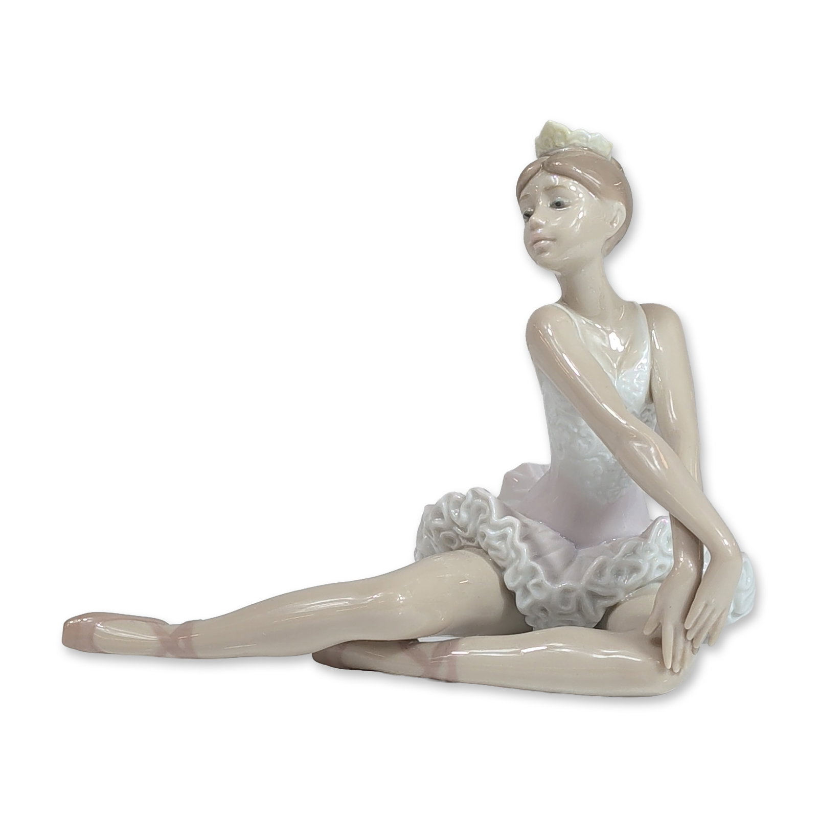 Lladro Spanish Porcelain Graceful Pose Ballerina 6174: Lladro Spanish glazed porcelain figurine, model 6174 titled Graceful Pose or Gracia Y Belleza, depicting a seated ballerina in a resting pose. The figure is modeled with a pale pink and white tutu fea