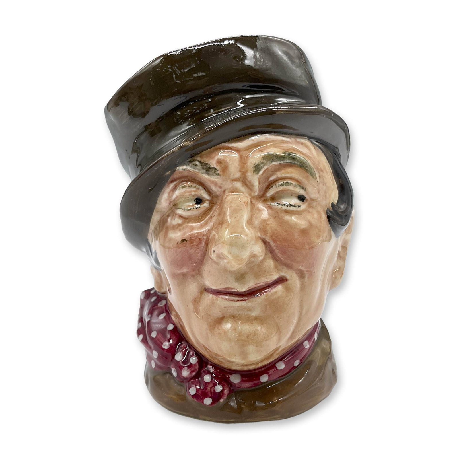 Sam Weller D5841 - Small - Royal Doulton Character Jug: Dark brown hat; light brown coat; red kerchief with white sports. Royal Doulton backstamp. Artist: Leslie Harradine and Harry Fenton Dimensions: 3.25"H Date or Era: 1948 - 1960 Manufacturer or Brand: 