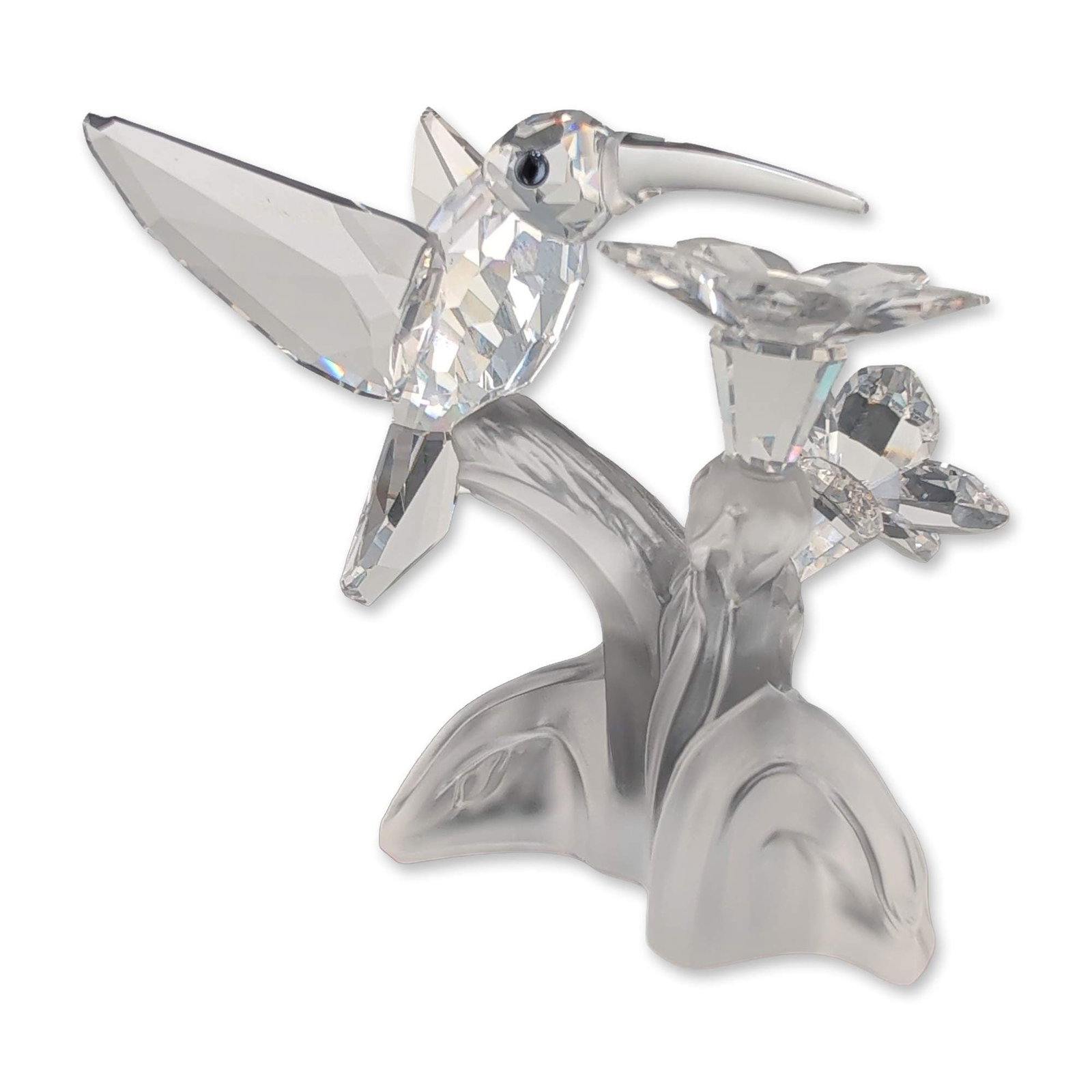 Swarovski Crystal Hummingbird on Flower Figurine: Swarovski crystal figurine from the Silver Crystal collection, depicting a hummingbird in flight positioned to drink from two bell-shaped flowers. The bird and blossoms are composed of faceted clear l
