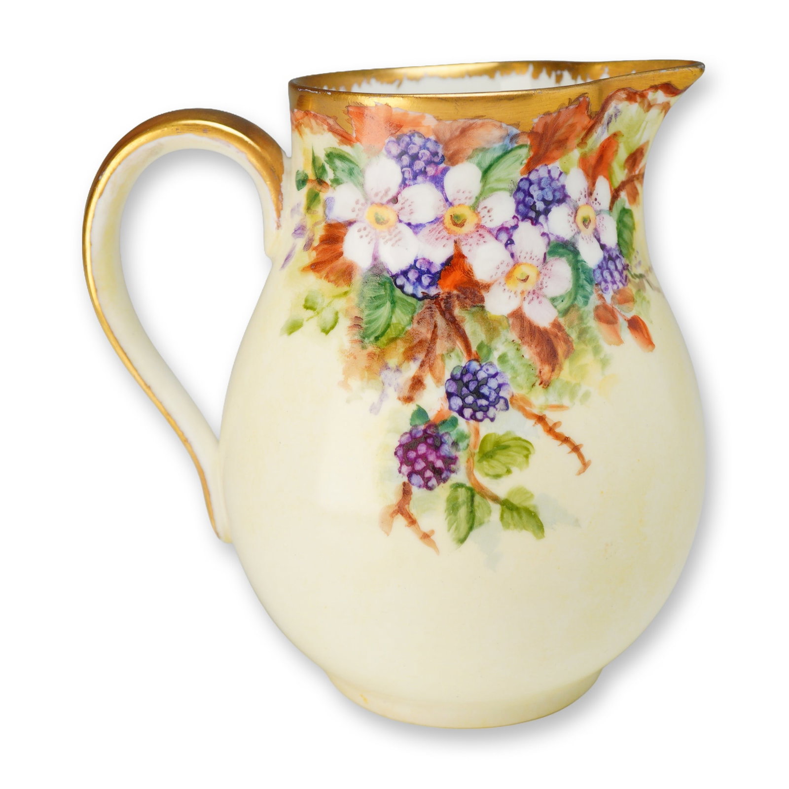 Wedgwood Bone China Gilded Creamer Jug Signed Ellen Tattersall, c. 1950: A Wedgwood bone china cream jug or small pitcher featuring a bulbous body, a flared rim with a pinched spout, and a gilded loop handle. The exterior is hand-painted with a botanical motif of blackberr
