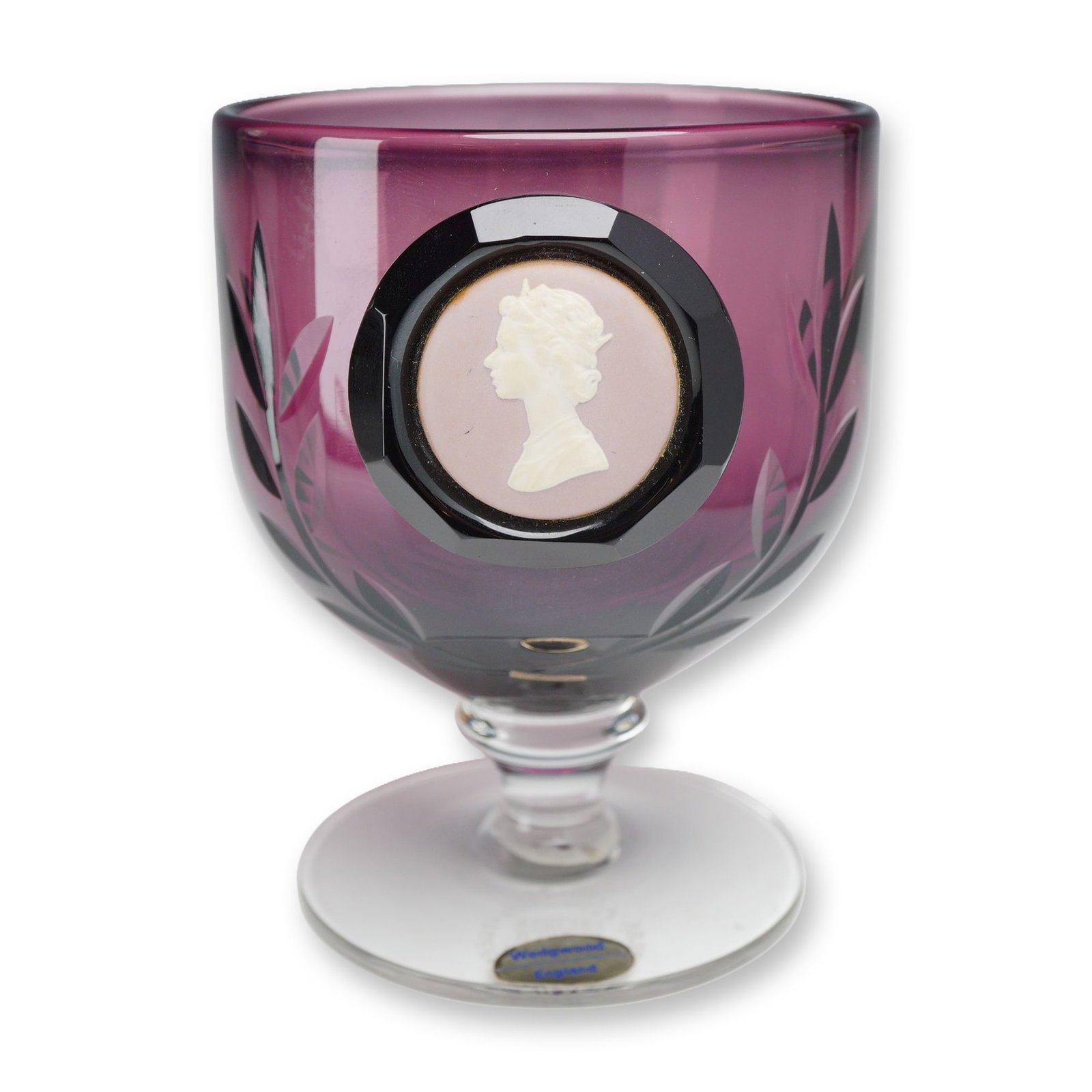 Wedgwood Queen Elizabeth II Silver Jubilee Limited Edition Amethyst Glass Cameo Goblet: This commemorative amethyst glass goblet was produced by Wedgwood to celebrate the 1977 Silver Jubilee of Queen Elizabeth II. The piece is crafted from deep amethyst-colored glass and features a clear