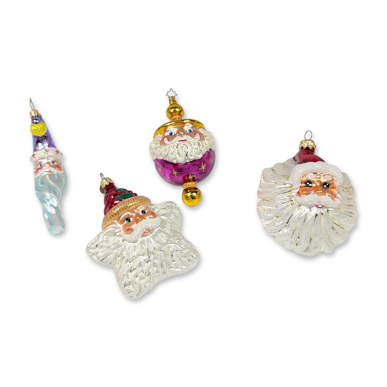 4pc Christopher Radko Glass Santa Ornaments: Christopher Radko. Group of four glass Christmas ornaments in various Santa Claus forms, hand-painted and mouth-blown with lacquer and glitter embellishments. Collection includes a star-shaped Santa,