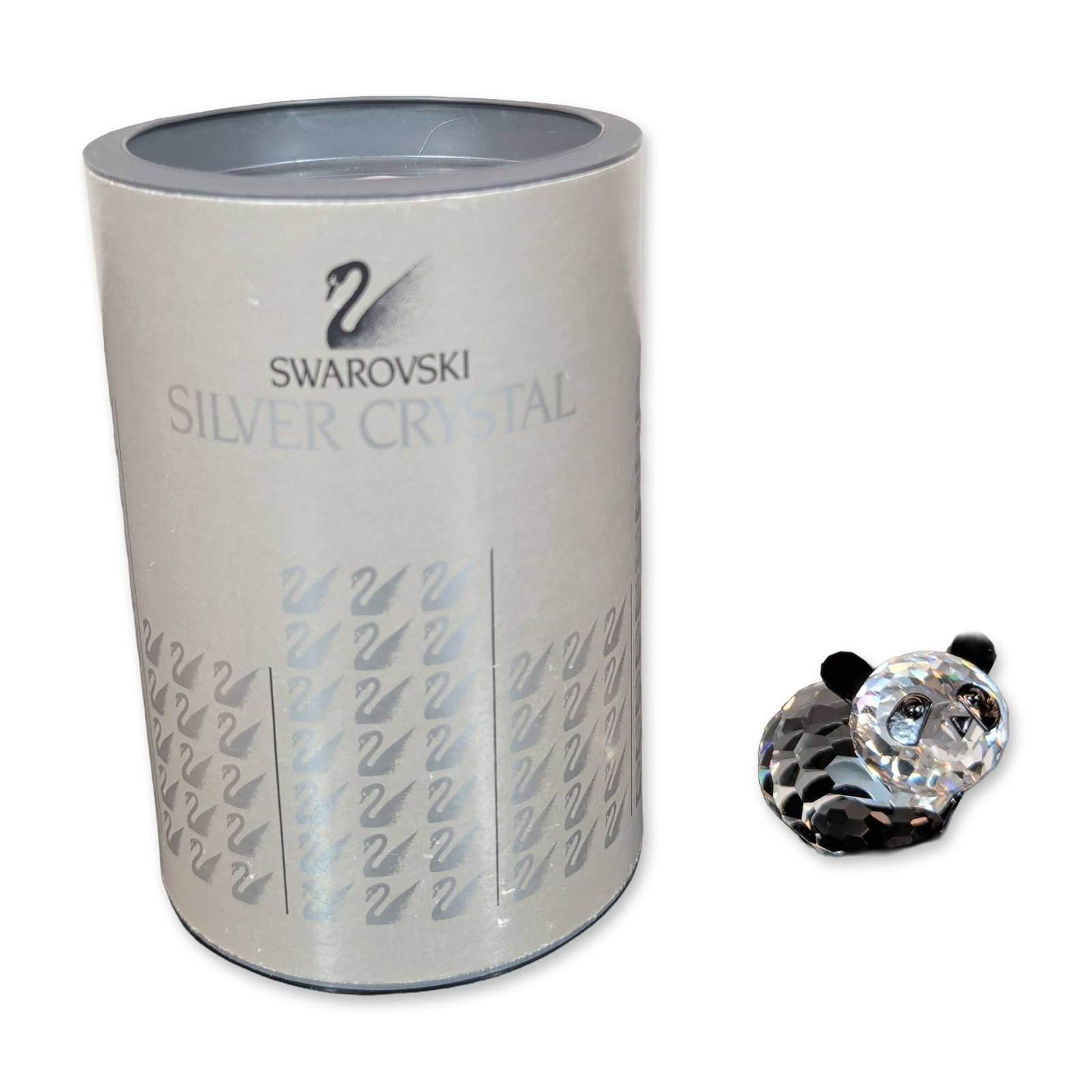 Swarovski Crystal Mother Panda Figurine: Swarovski Silver Crystal panda figurine in a seated pose. The piece features a faceted lead crystal head and body with jet black crystal accents on the ears, eyes, and limbs. An acid-etched Swarovski