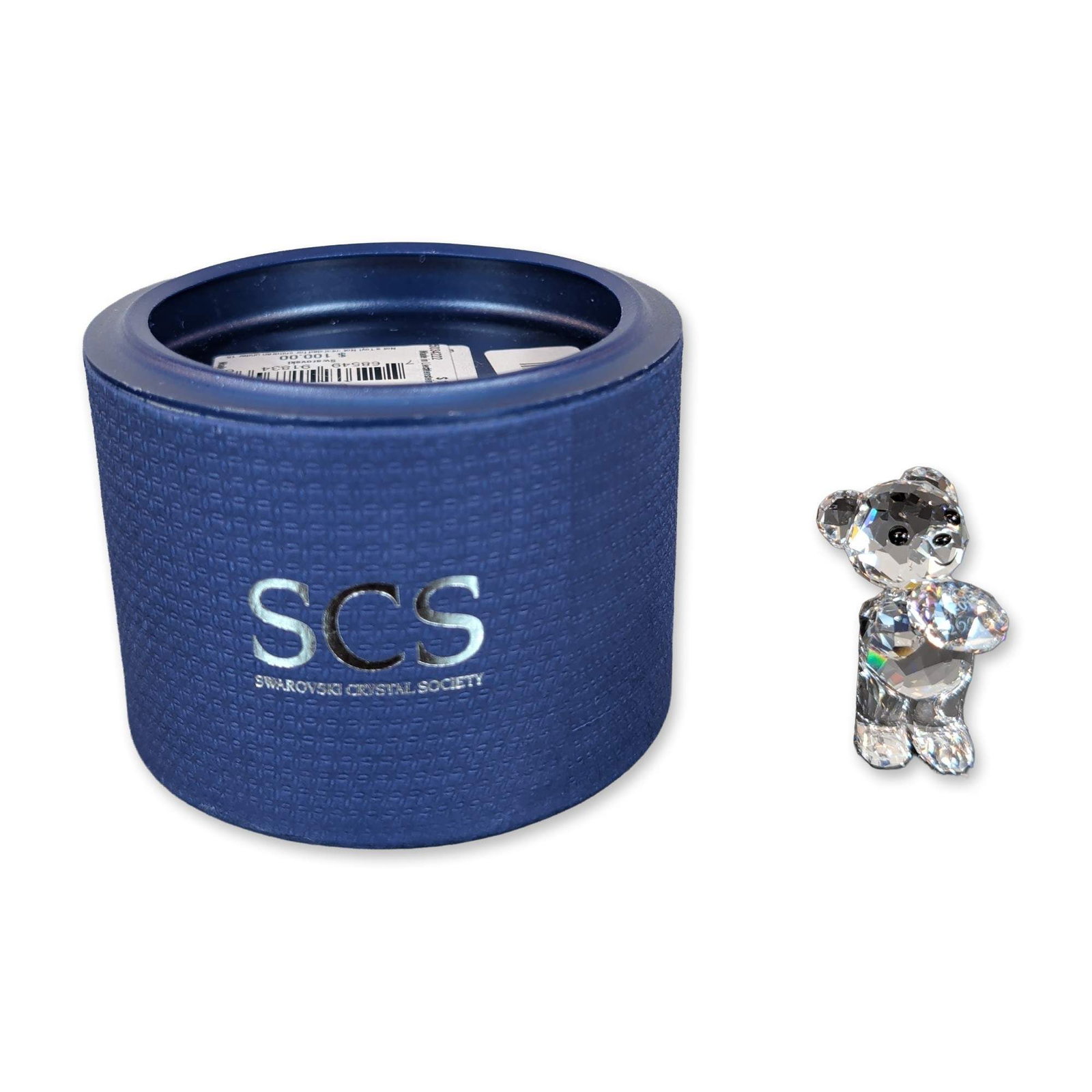 Swarovski Crystal Society 2013 Limited Edition Kris Bear: Swarovski Crystal Society (SCS) limited edition Kris Bear commemorating the 25th anniversary of the series. The figurine is constructed from clear faceted crystal with jet crystal eyes and nose. The