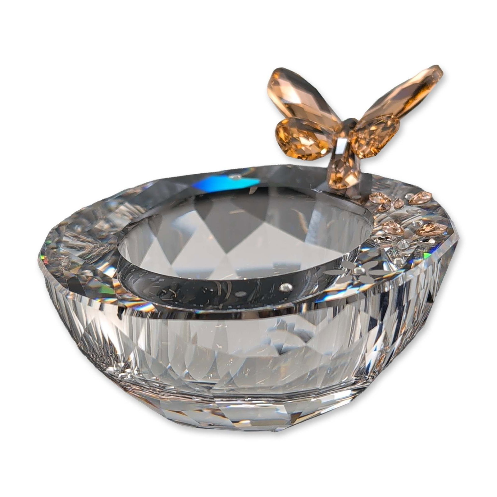 Swarovski Crystal Butterfly Tea Light Holder: Swarovski Austrian lead crystal tea light holder, also known as the Butterfly Tea Light. The object consists of a heavy, multifaceted clear lead crystal bowl designed for a standard tea light candle. 