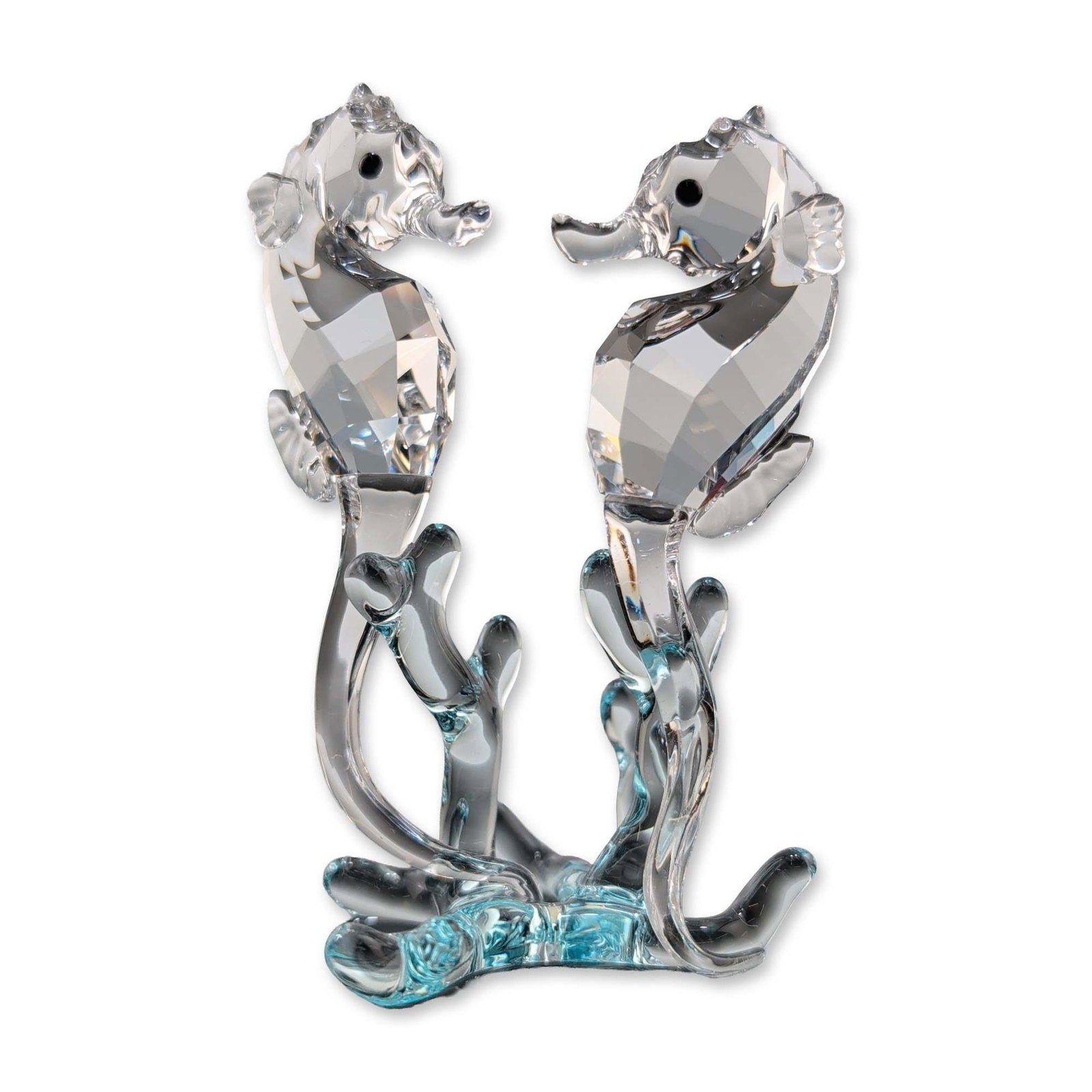 Swarovski Austrian Crystal Sea Horses Figurine: Swarovski crystal figurine, model number 0885589, featuring two seahorses on a coral-style base. The seahorses are composed of faceted clear crystal bodies with smooth heads, tails, and small black in