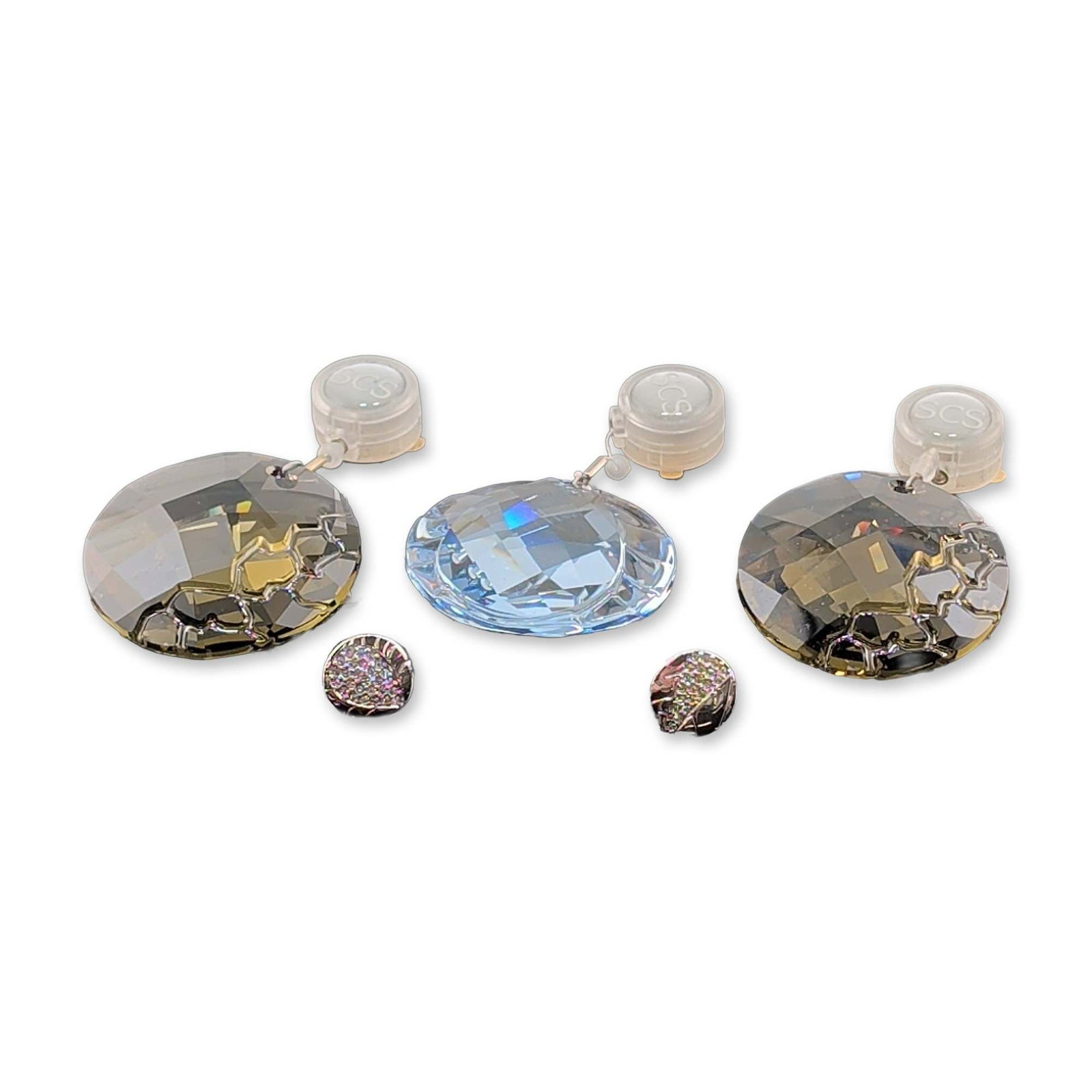 5pc Swarovski Crystal Society Window Ornaments and Pins: Swarovski collection of three faceted crystal suncatcher window ornaments in champagne and light blue hues. Each piece includes a retractable hanging mechanism embossed with the SCS logo for the Swaro