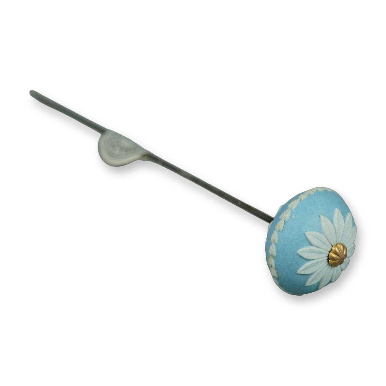 Wedgwood Blue and White Jasperware Daisy Floral Hat Pin: A Wedgwood jasperware hat pin featuring a circular, domed head in light blue stoneware. The head is decorated with white sprigged relief details, including a central daisy floral motif and a perimeter