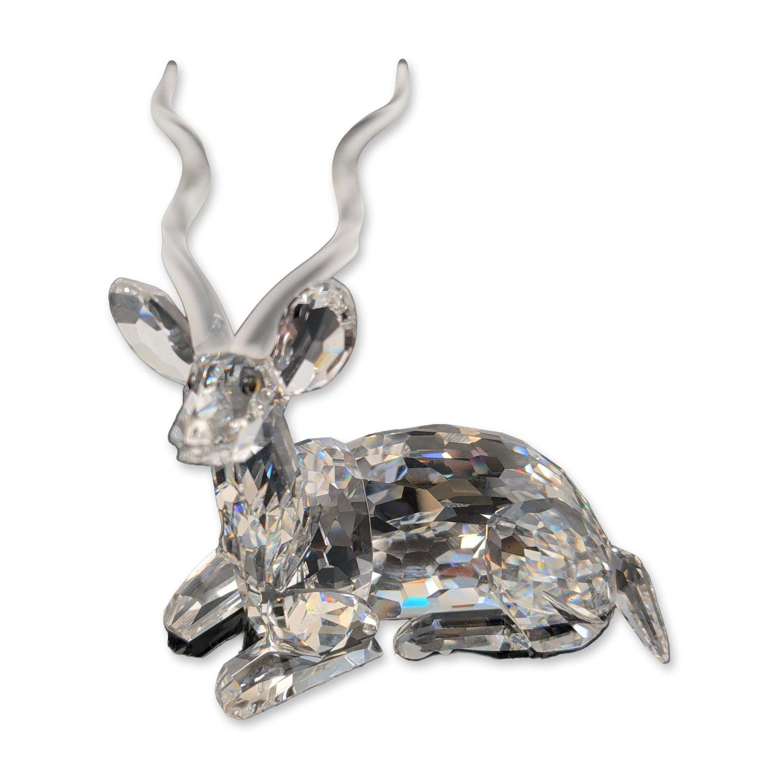 Swarovski Inspiration Africa Crystal Figurine, Kudu: Swarovski crystal figurine titled The Kudu, the 1994 annual edition for the Swarovski Crystal Society (SCS). Designed by Michael Stamey and part of the Inspiration Africa trilogy, the piece is crafted
