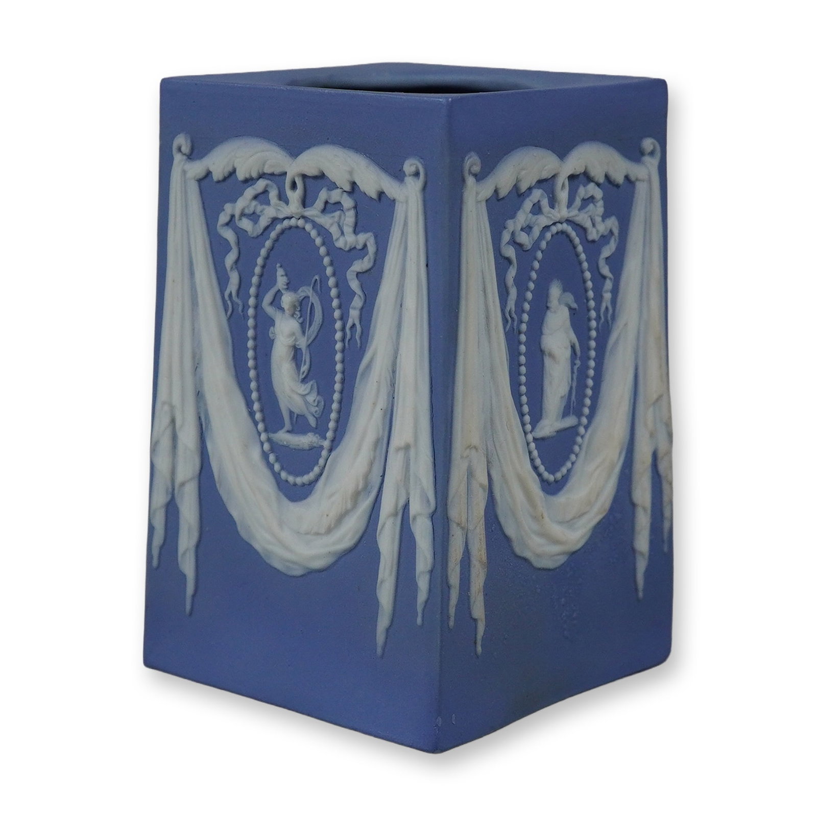 Turner and Co Blue Jasperware Lighter Body Pedestal: This square-section pedestal or lustre base was manufactured by the English pottery firm Turner and Co. in Staffordshire. It is crafted from a lighter body blue jasperware, a fine-grained unglazed sto