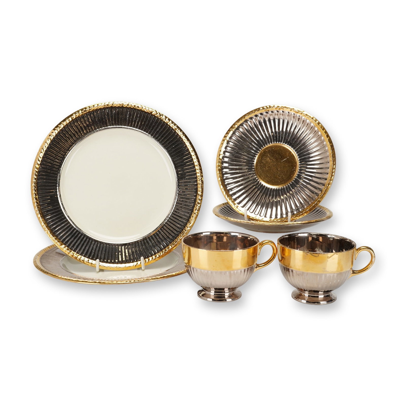 6pc Wedgwood Art Deco Lusterware Tea Service: This 6 piece tea service for two is manufactured by Wedgwood in England and reflects the Art Deco style of the early 20th century. The service is crafted from cream-colored earthenware, often referred