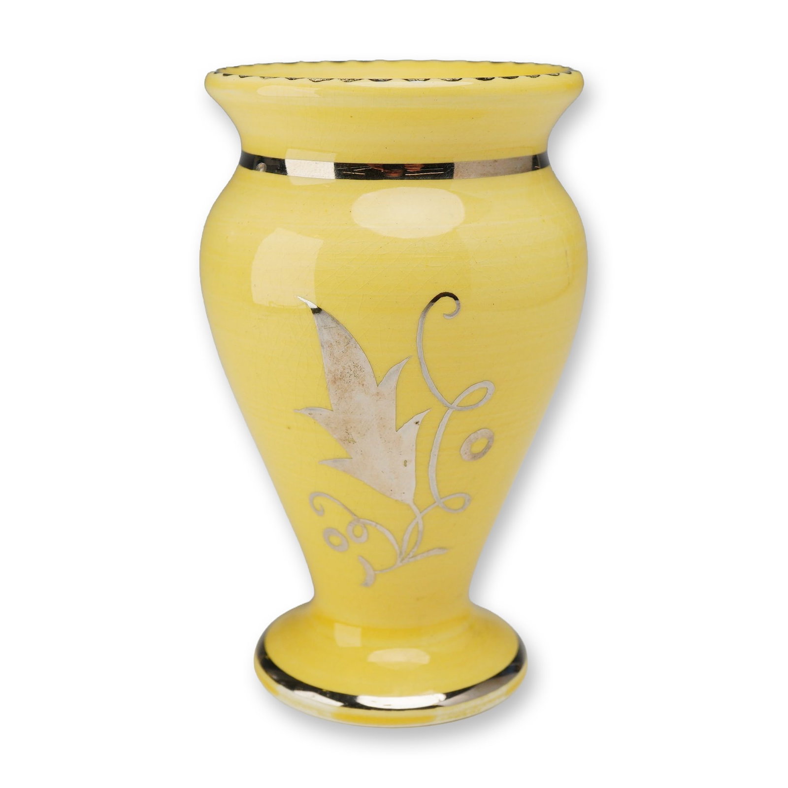 Wedgwood Glazed Porcelain Urn Vase with Silver Luster Decoration: A Wedgwood glazed porcelain urn vase featuring a bright yellow ground. The exterior is decorated with stylized foliate motifs in silver luster, including a large acanthus leaf and scrolling tendrils.