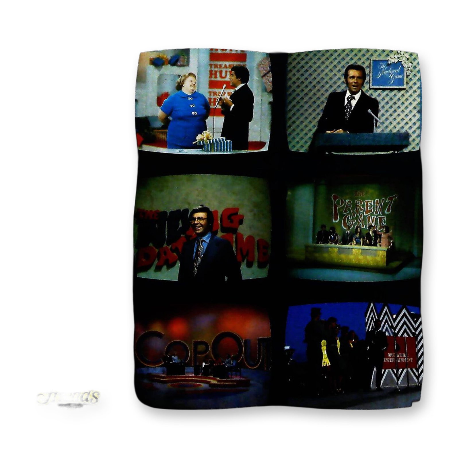 Chuck Barris Presents Themes From TV Game Shows Vinyl LP Friends Records SAR 1001: This 12-inch vinyl LP album is titled Chuck Barris Presents Themes From TV Game Shows and was issued by Friends Records under catalog number SAR 1001. The front cover features a black background with 
