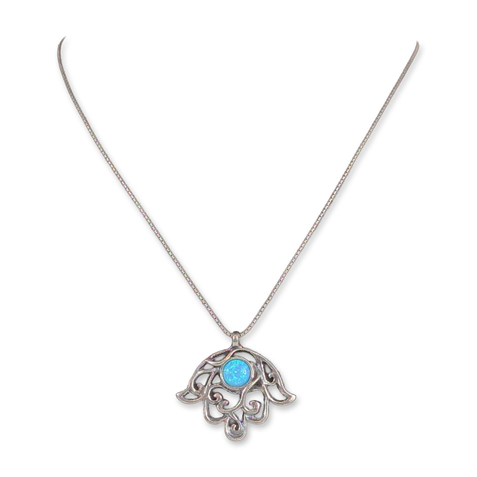 Israeli Sterling Silver Hamsa Necklace: Israeli Hamsa pendant necklace in sterling silver, featuring a filigree-style scrollwork design set with a round cabochon-cut synthetic blue opal. The pendant is suspended from a fine sterling silver 