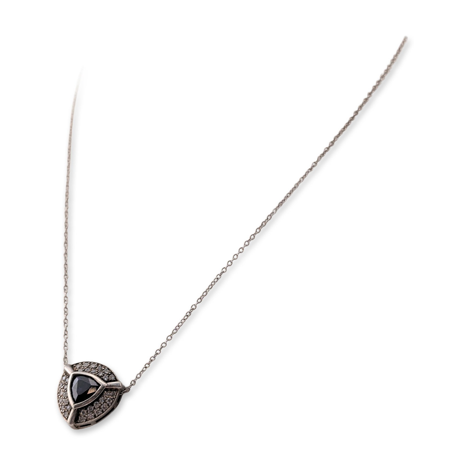 Sterling Silver Amethyst Pendant Necklace: Modern style sterling silver pendant necklace featuring a geometric triangular slider pendant. The center is set with a trillion-cut faceted amethyst, secured within a frame with three radiating bars.
