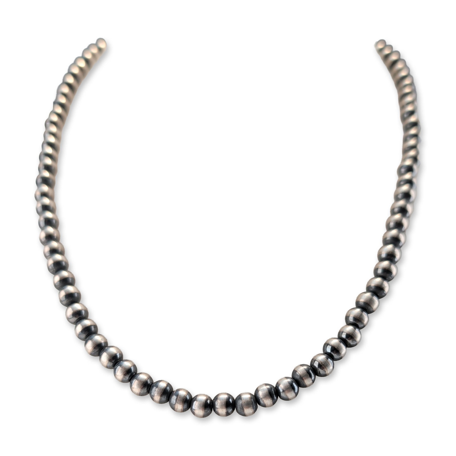 Sterling Silver Southwestern Navajo Pearl Style Beaded Necklace: Southwestern Navajo Pearl style single-strand beaded necklace in sterling silver. The strand features uniform round beads with a brushed satin finish and intentional bench-made oxidation. Terminating 