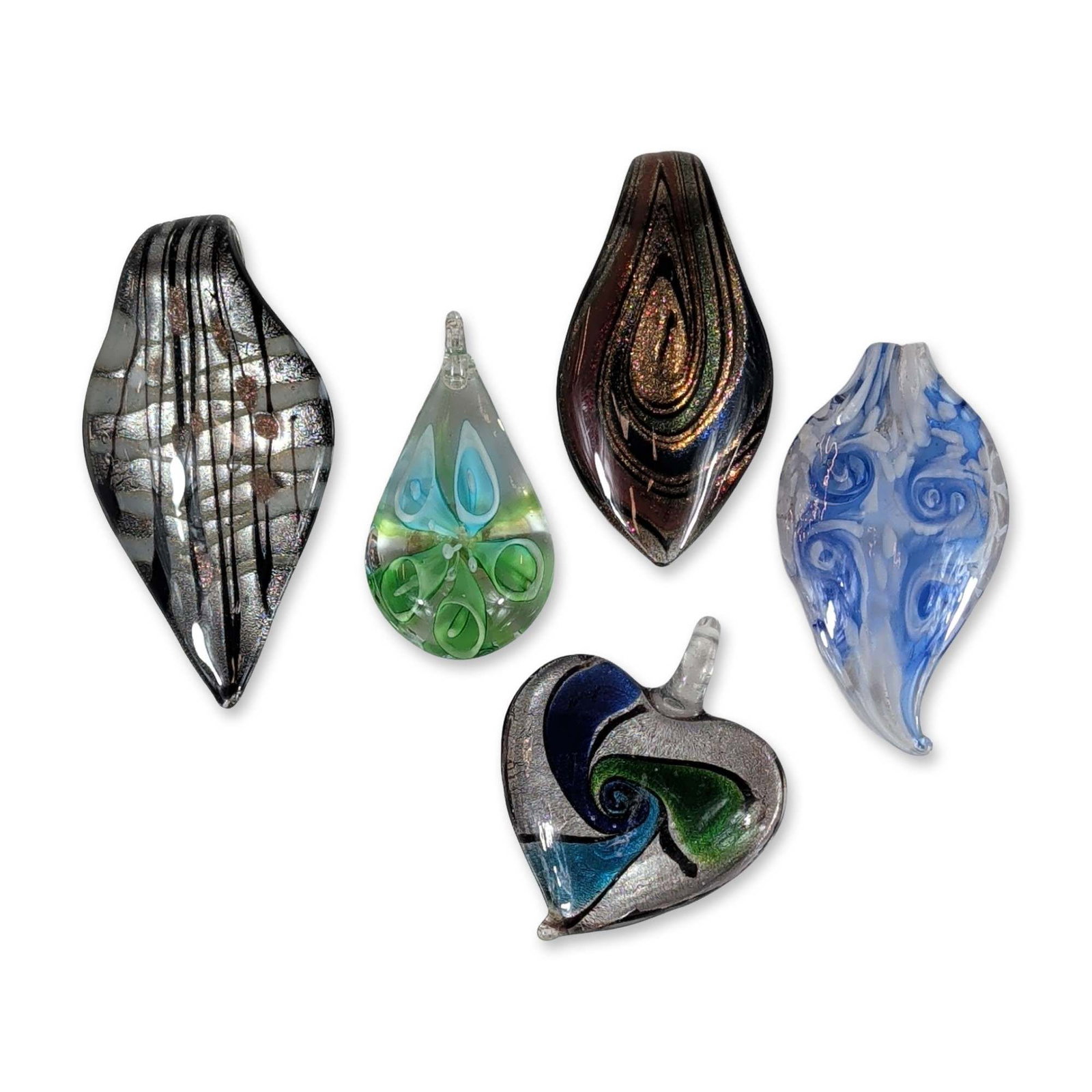 5pc Hand Blown Glass Pendants: An assortment of contemporary lampwork glass pendants in a variety of shapes including heart, leaf, and teardrop forms. The collection features diverse decorative techniques such as internal