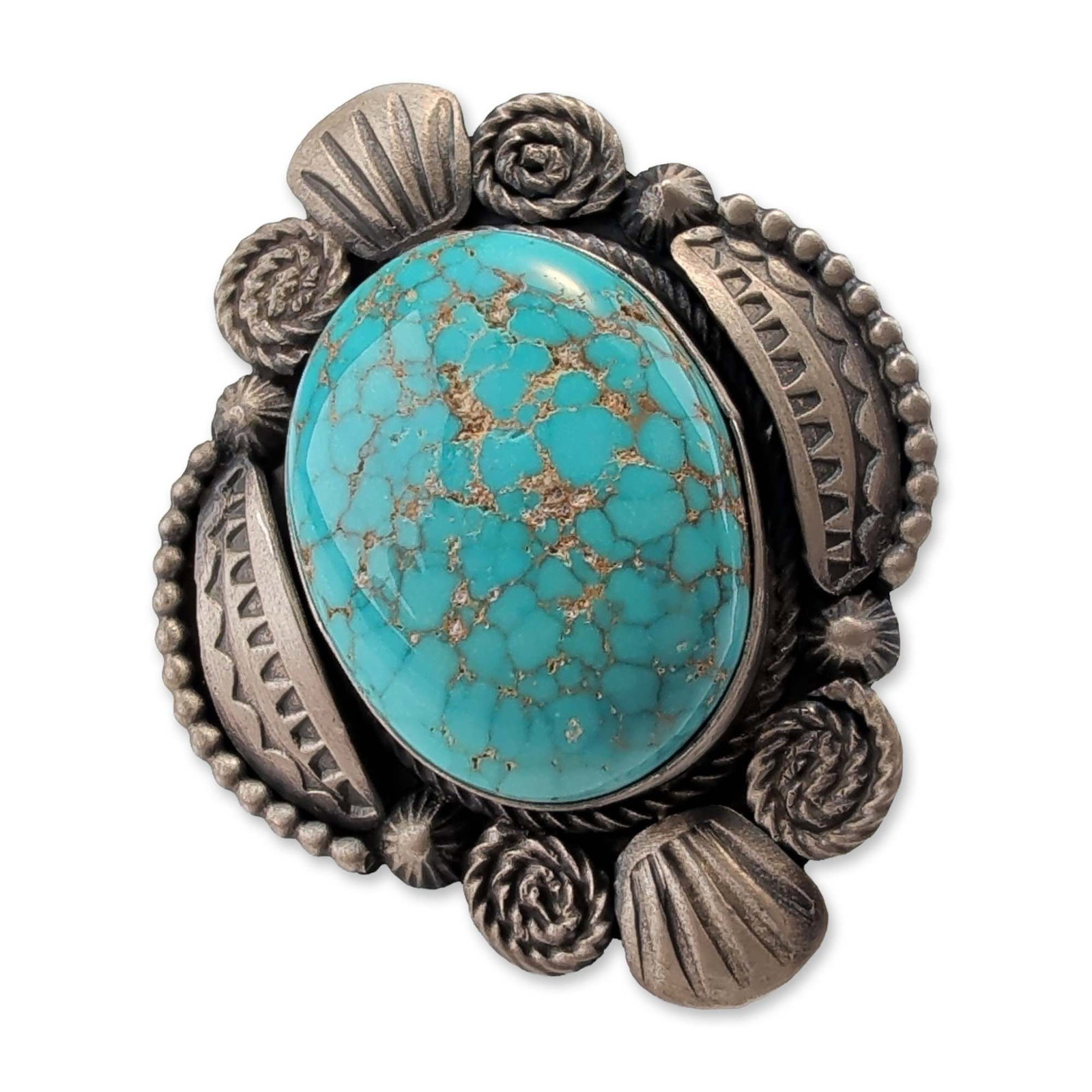 Southwest Sterling Silver Spiderweb Turquoise Ring: Southwest style statement ring in sterling silver, centered with a large oval turquoise cabochon featuring a prominent brown spiderweb matrix. The elaborate mounting includes stamped geometric triangl