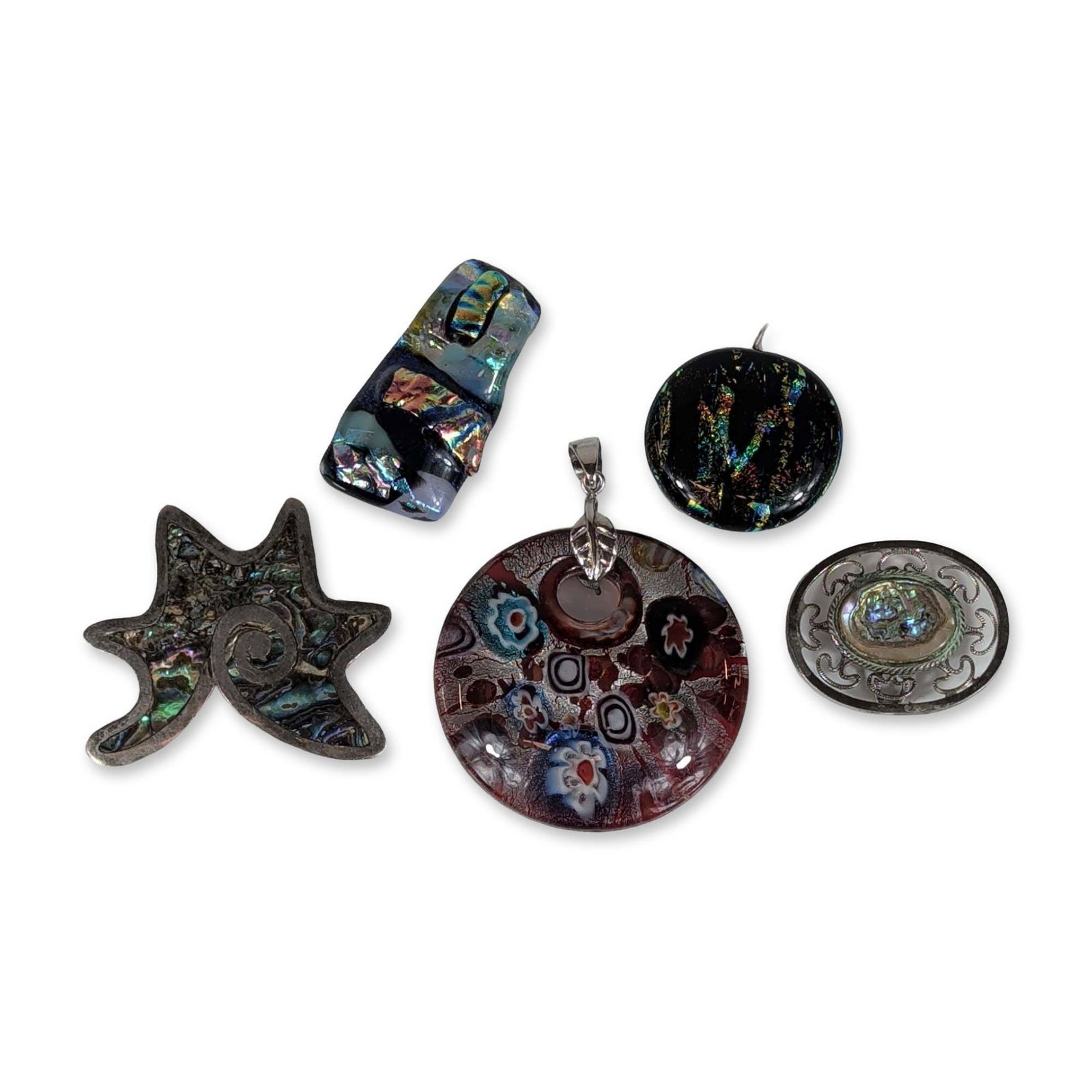 5pc Fused Glass and Abalone Shell Jewelry: Collection of jewelry featuring fused glass and abalone shell components. The group includes a circular millefiori glass pendant with colorful murrine patterns in red, blue, and white against a dark g