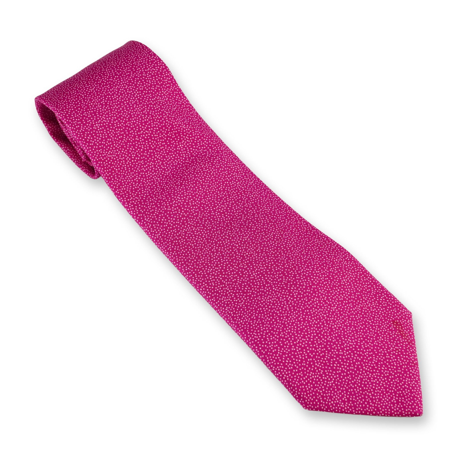 Hermes Paris 100% Silk Gentlemen's Tie: This gentlemen's necktie by Hermes, Paris is crafted in France from 100% silk. The design features a fuchsia pink ground decorated with an all-over white pinpoint speckled polka dot pattern. The rever