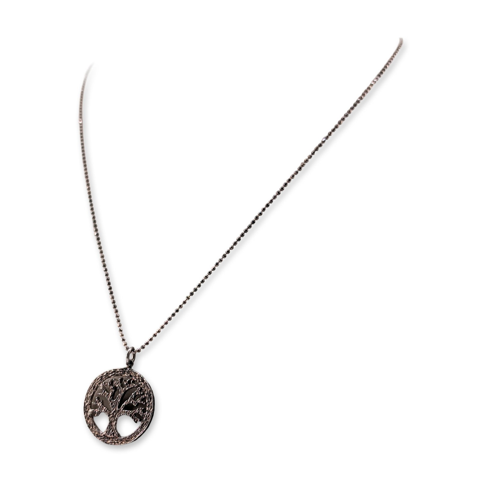 Italian Sterling Silver Tree of Life Pendant Necklace: Italian sterling silver necklace featuring a circular Tree of Life pendant with a dark oxidized finish. The openwork pendant depicts a tree with textured branches and a matching rim. The piece is susp