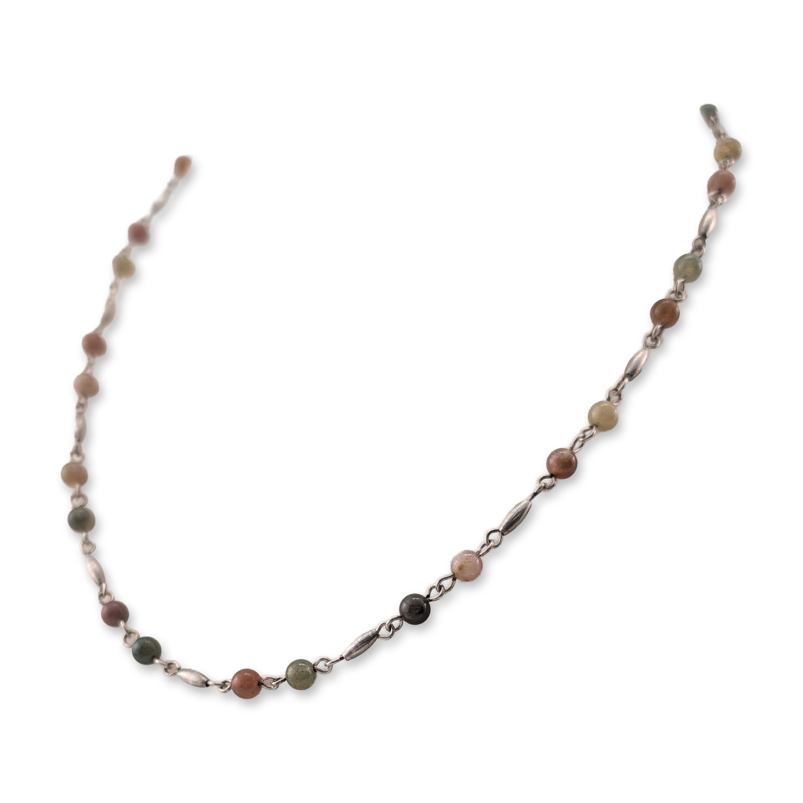 Sterling Silver Multi-Color Tourmaline Necklace: Sterling silver station necklace featuring round polished gemstone beads in a varied palette of pink, green, reddish-brown, and gray-green tones, characteristic of multi-color tourmaline. The design i