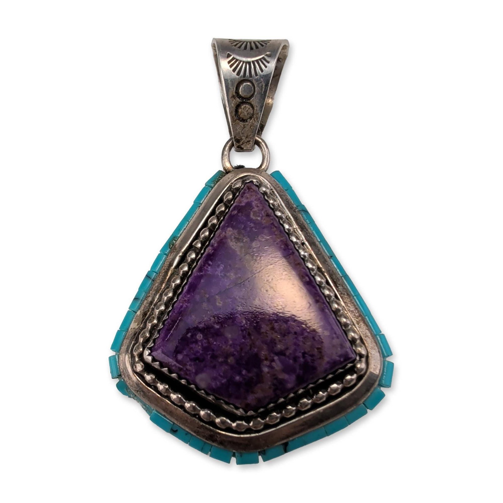 Irv Monte Navajo Sterling Silver Purple Stone and Turquoise Pendant: Irv Monte Navajo triangular pendant in sterling silver, featuring a central bezel-set purple stone with natural mottling, bordered by silver beads. The outer edge is finished with an inlaid row of